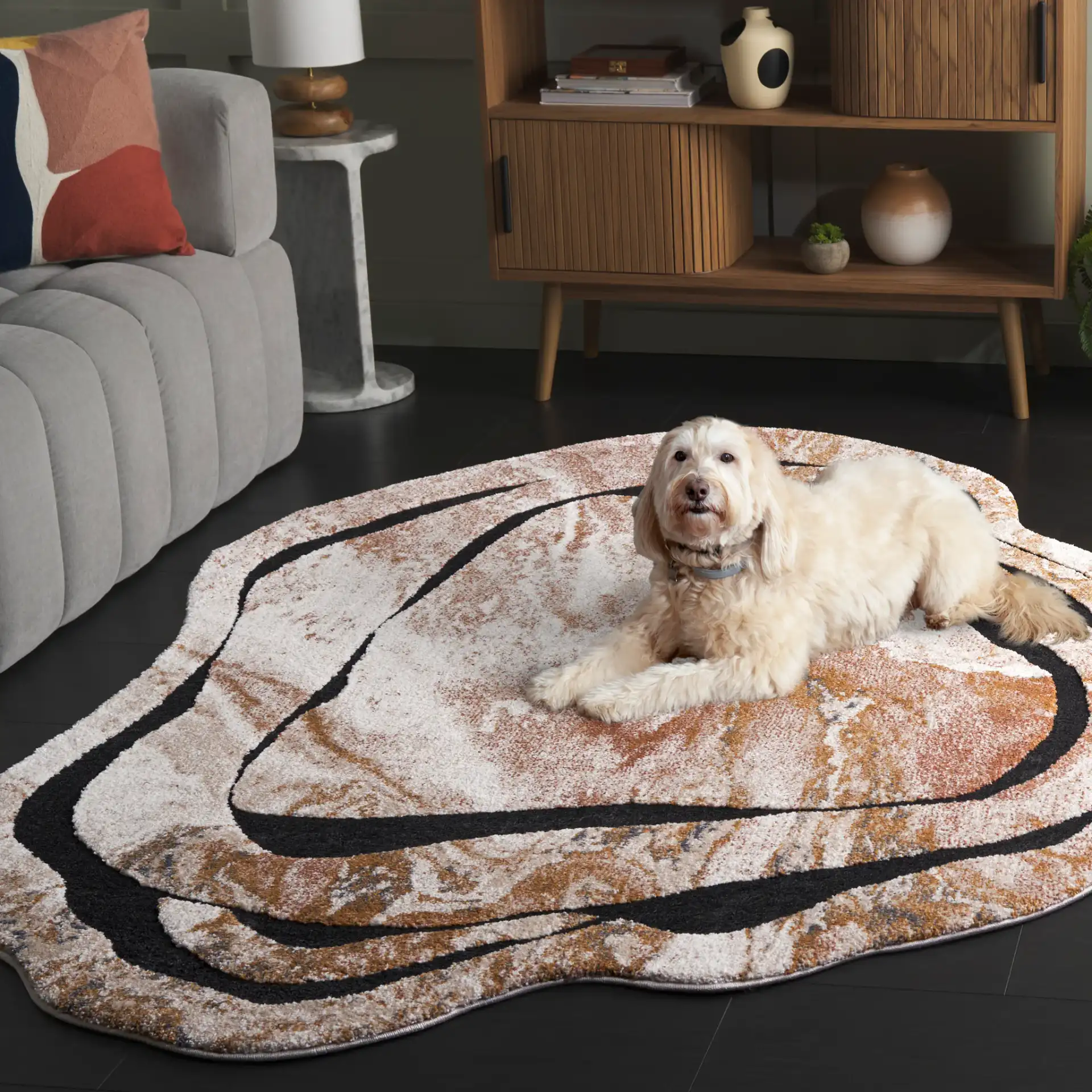 Contour Abstract Marbled Rug in Rust / Ivory in a styled room
