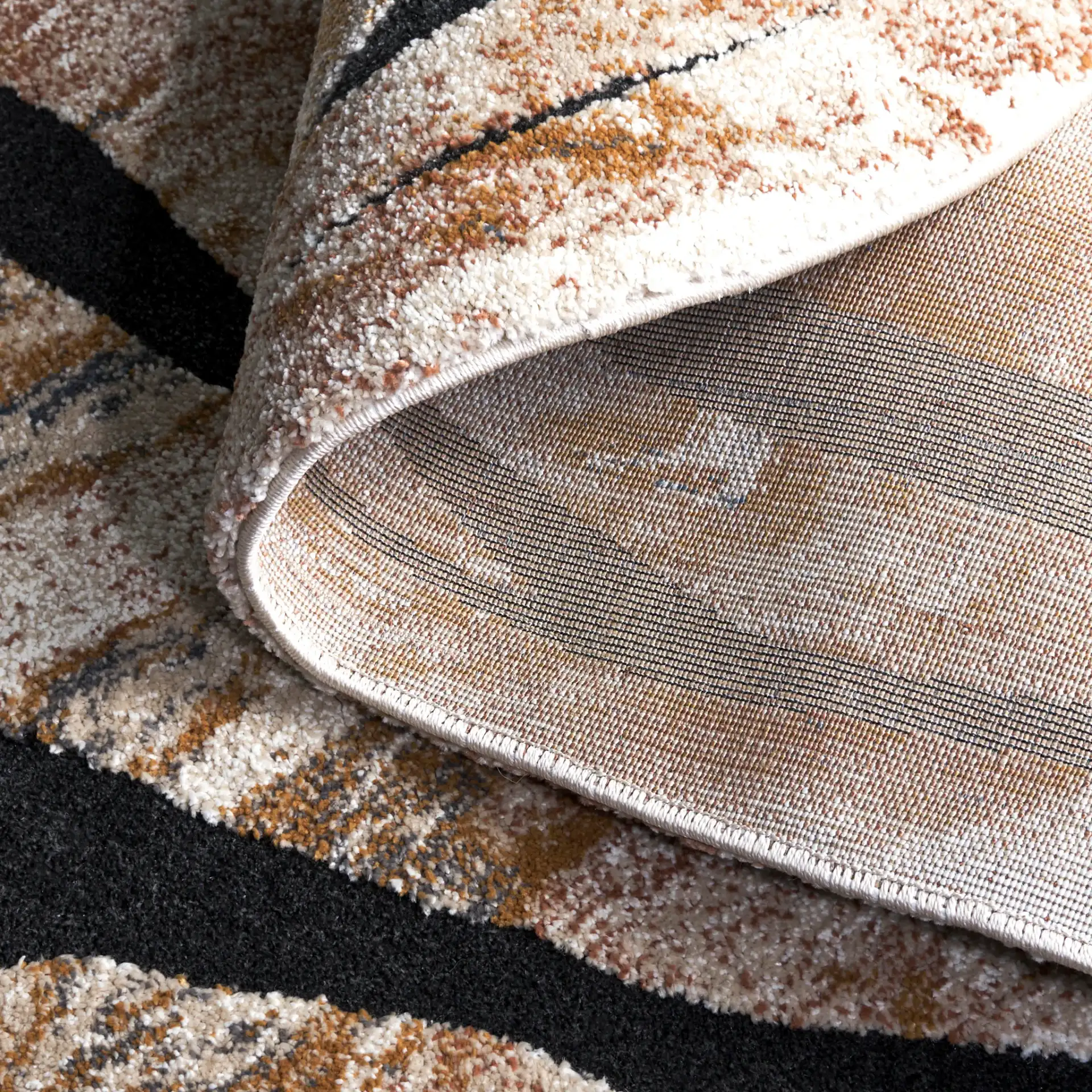 Contour Abstract Marbled Rug in Rust / Ivory in a styled room