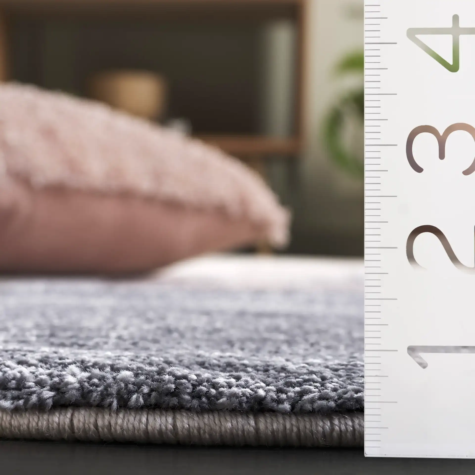 Contour Curved Abstract Rug in Gray / Ivory in a styled room