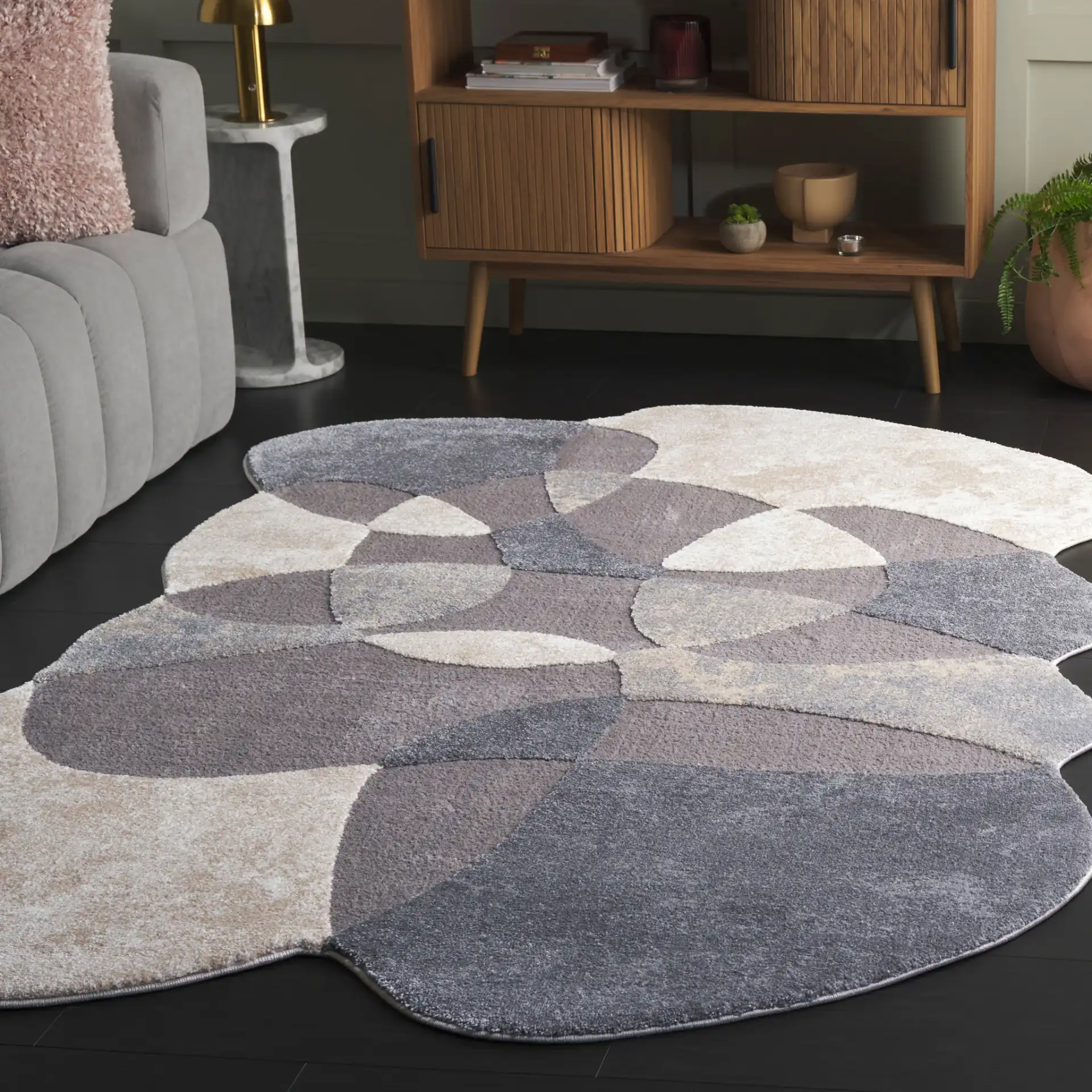 Contour Curved Abstract Rug in Gray / Ivory in a styled room