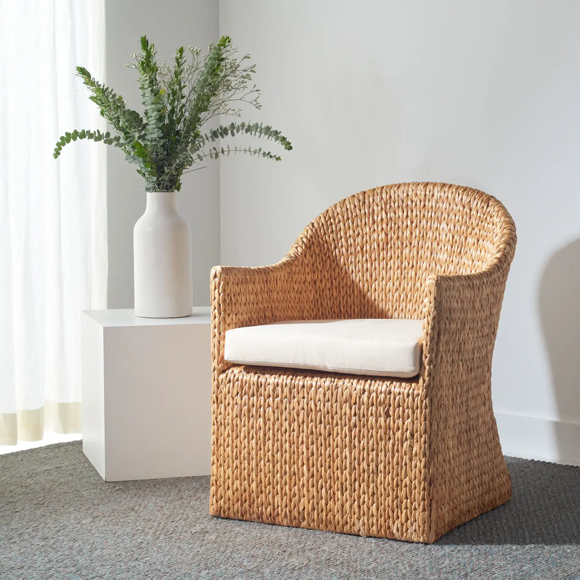Solomon Water Hyacinth Chair in Natural / Beige in a styled room