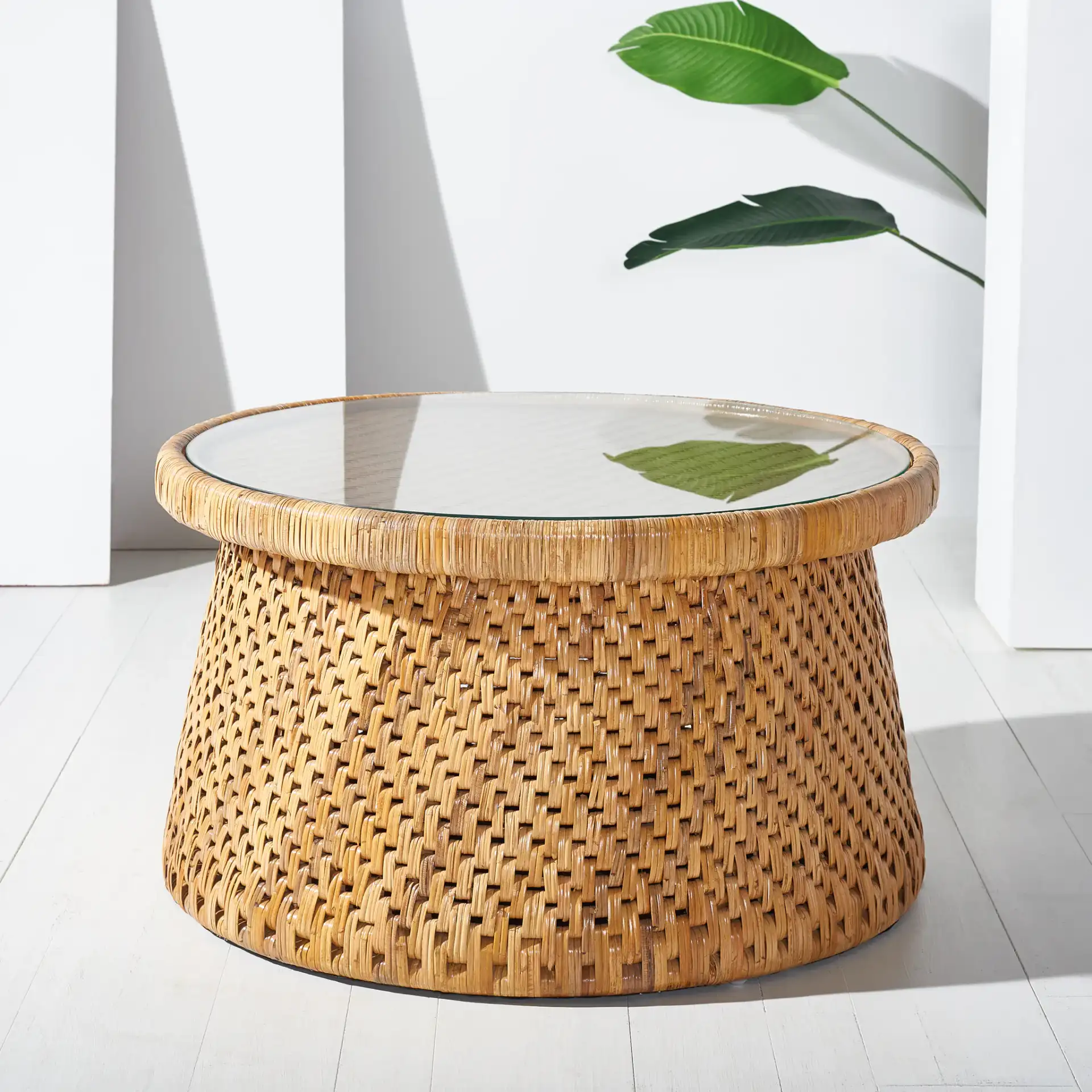 Lianne Rattan Round Coffee Table in Natural in a styled room