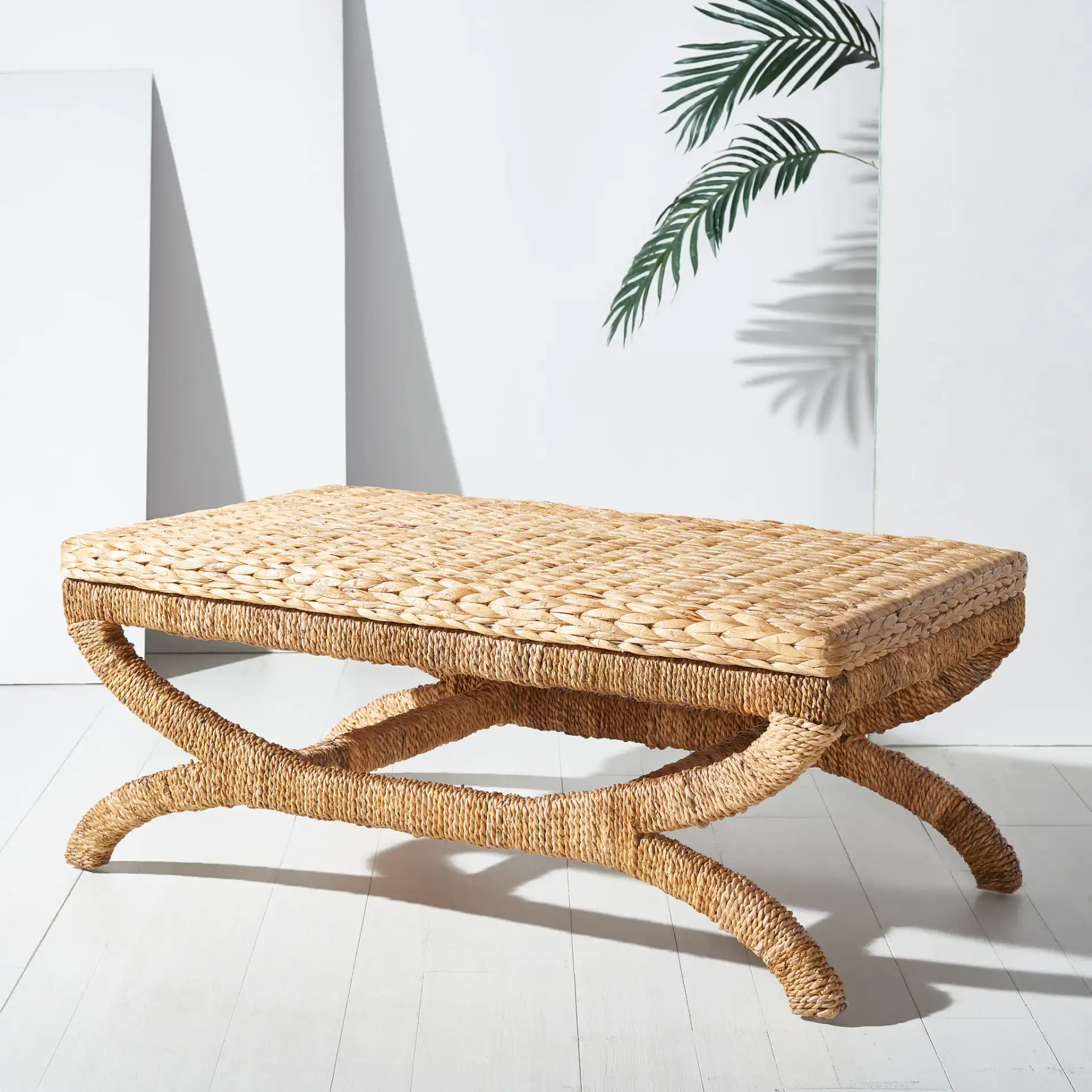 Caycee Waterhyacinth Table in Natural in a styled room