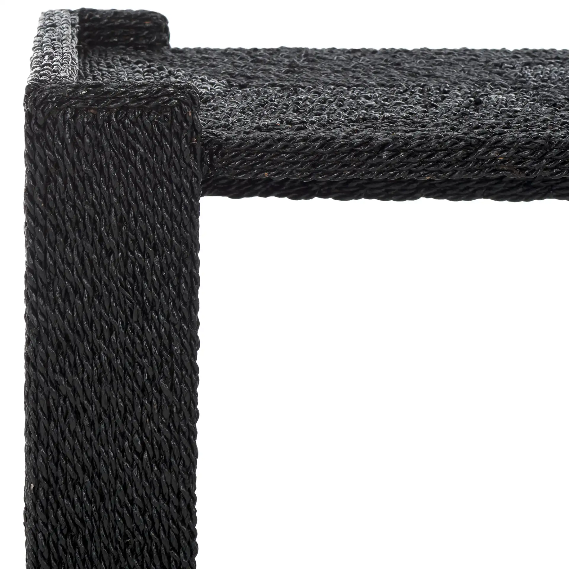Wynima Sea Grass Accent Table in Black in a styled room