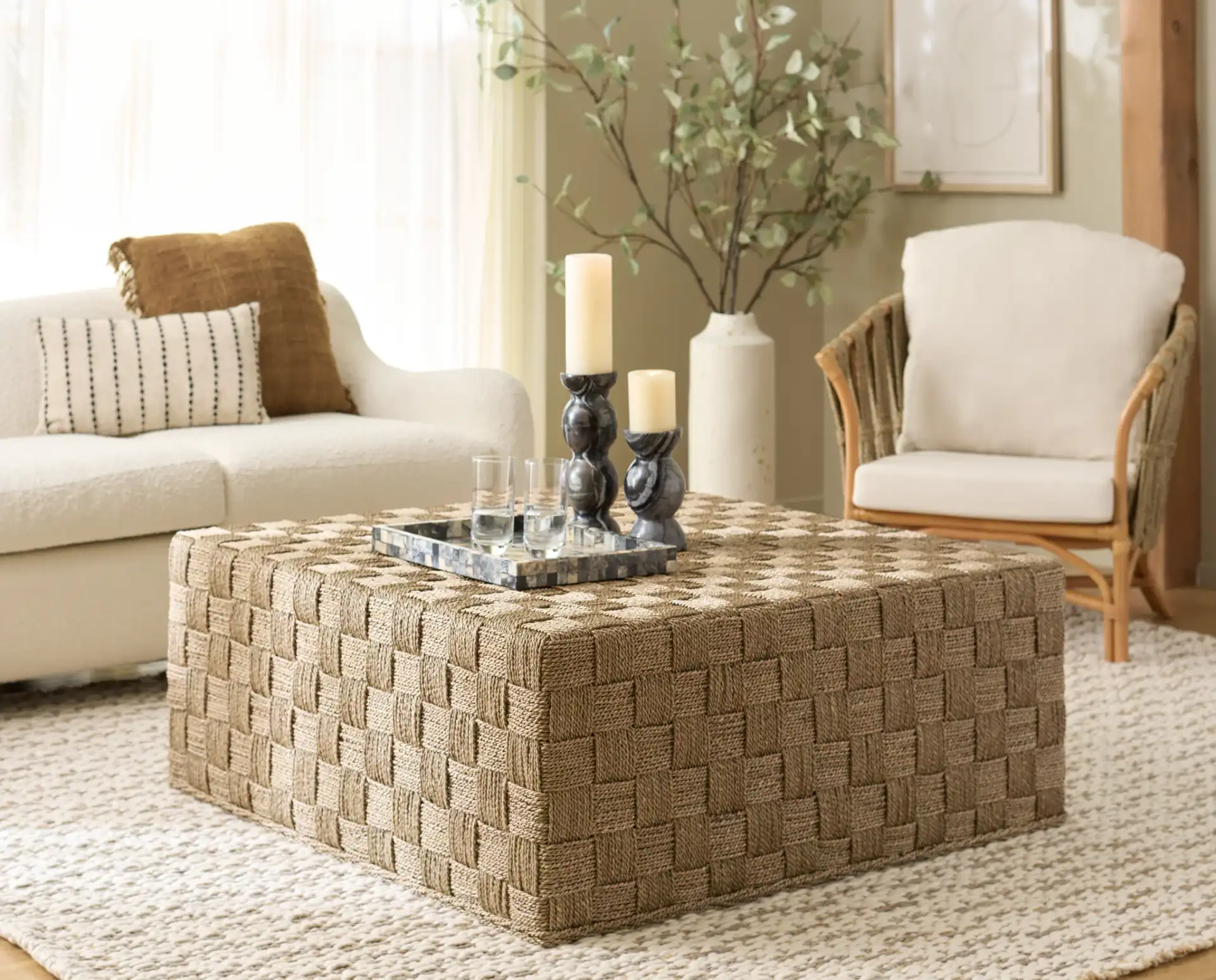 Norabelle Seagrass Coffee Table in Natural in a styled room
