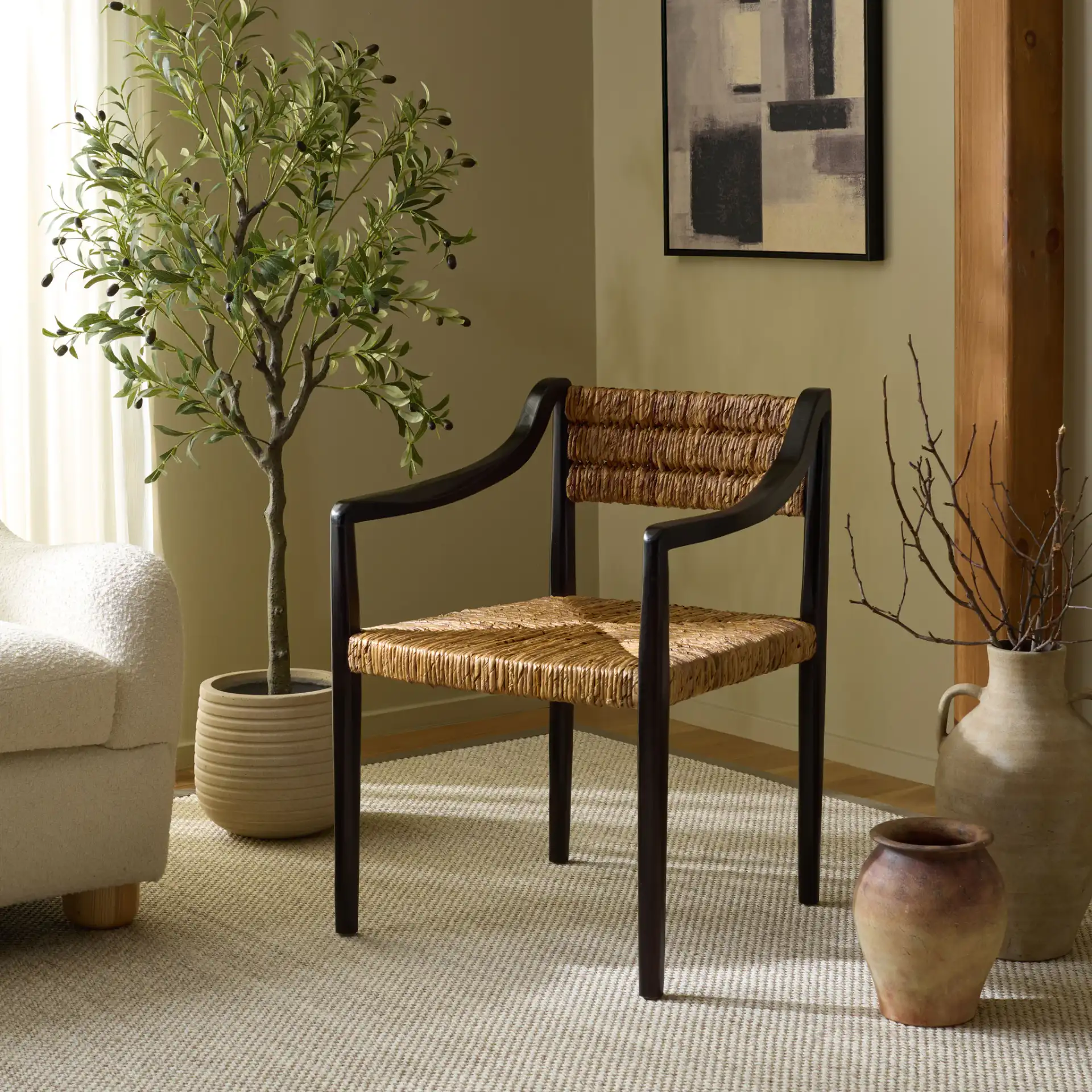Kona Woven Abaca Dining Chair in Black / Natural in a styled room