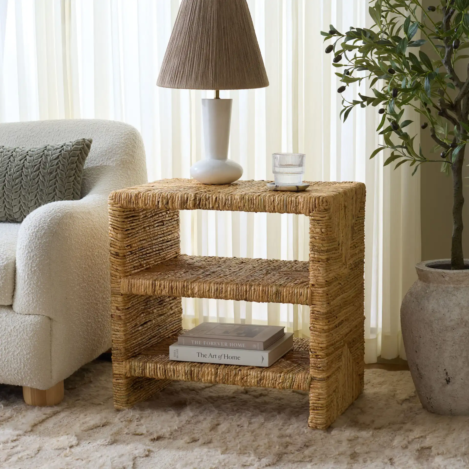 Fowler Abaca Accent Table in Natural in a styled room