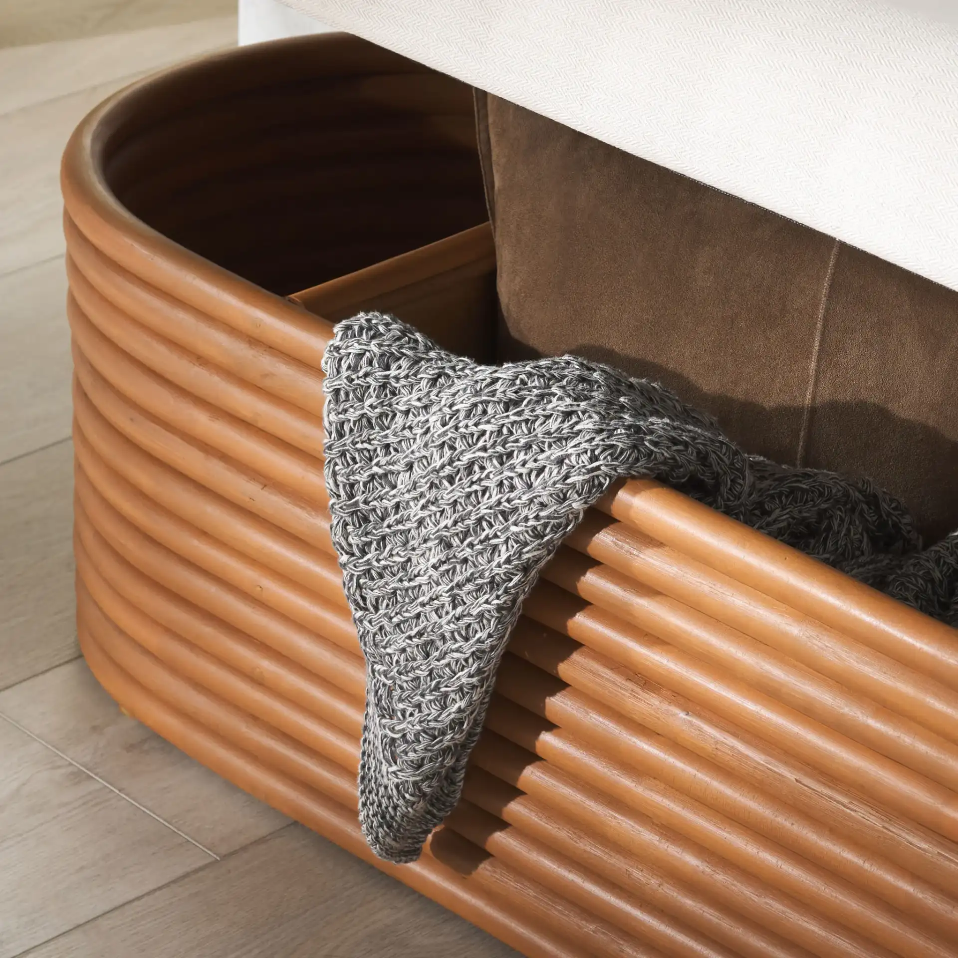 Bayard Rattan Storage Bench in Natural / White in a styled room