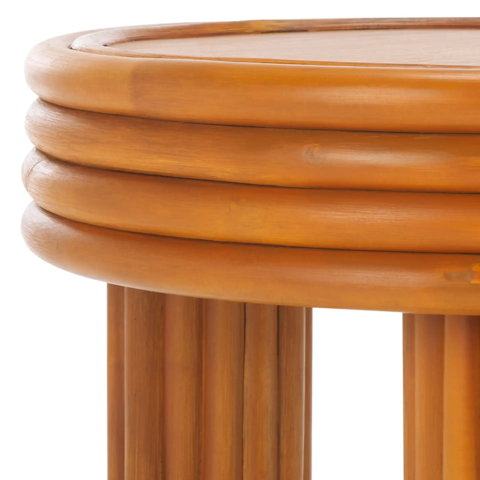 Bayard Rattan Round Accent Table in Natural in a styled room