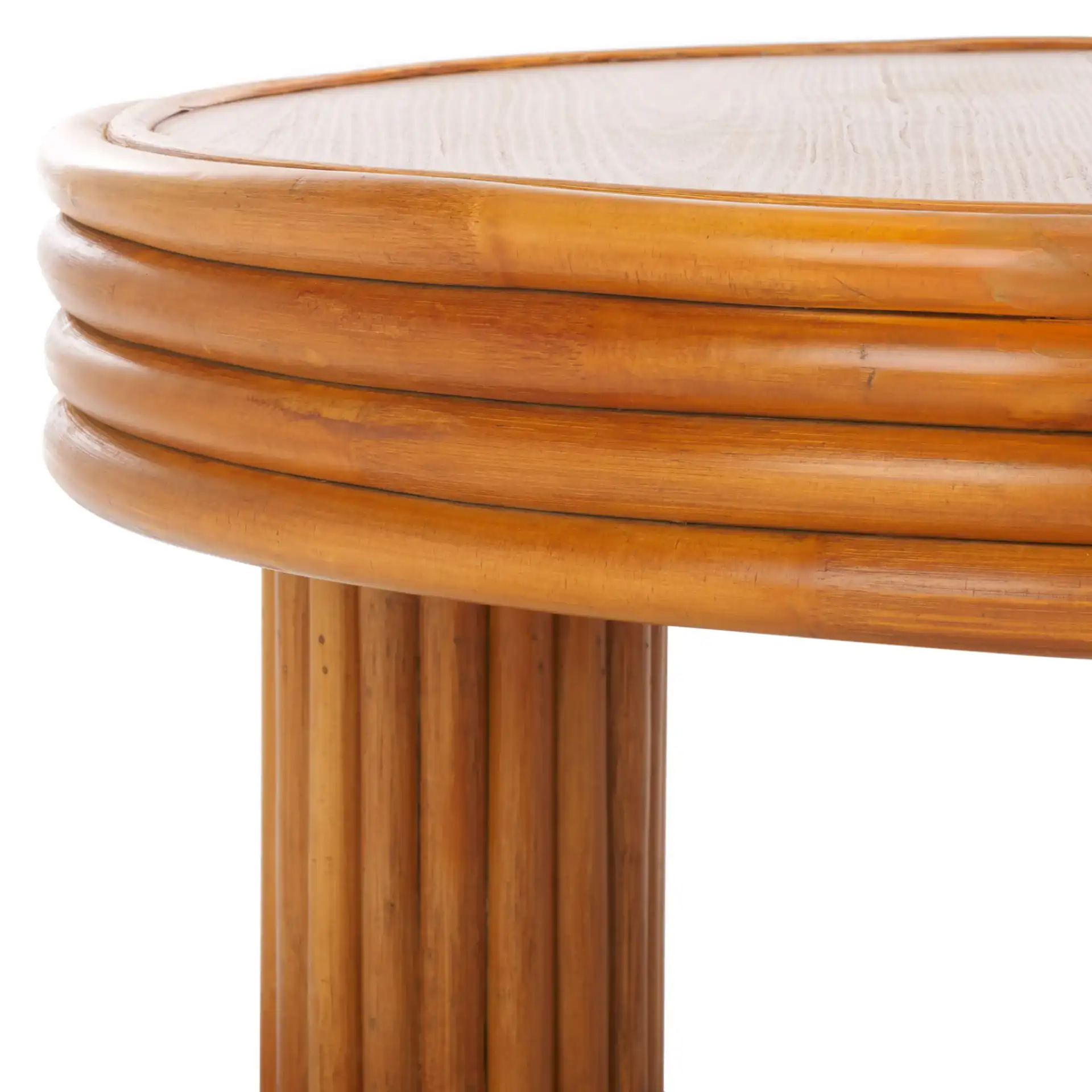 Bayard Rattan Round Coffee Table in Natural in a styled room