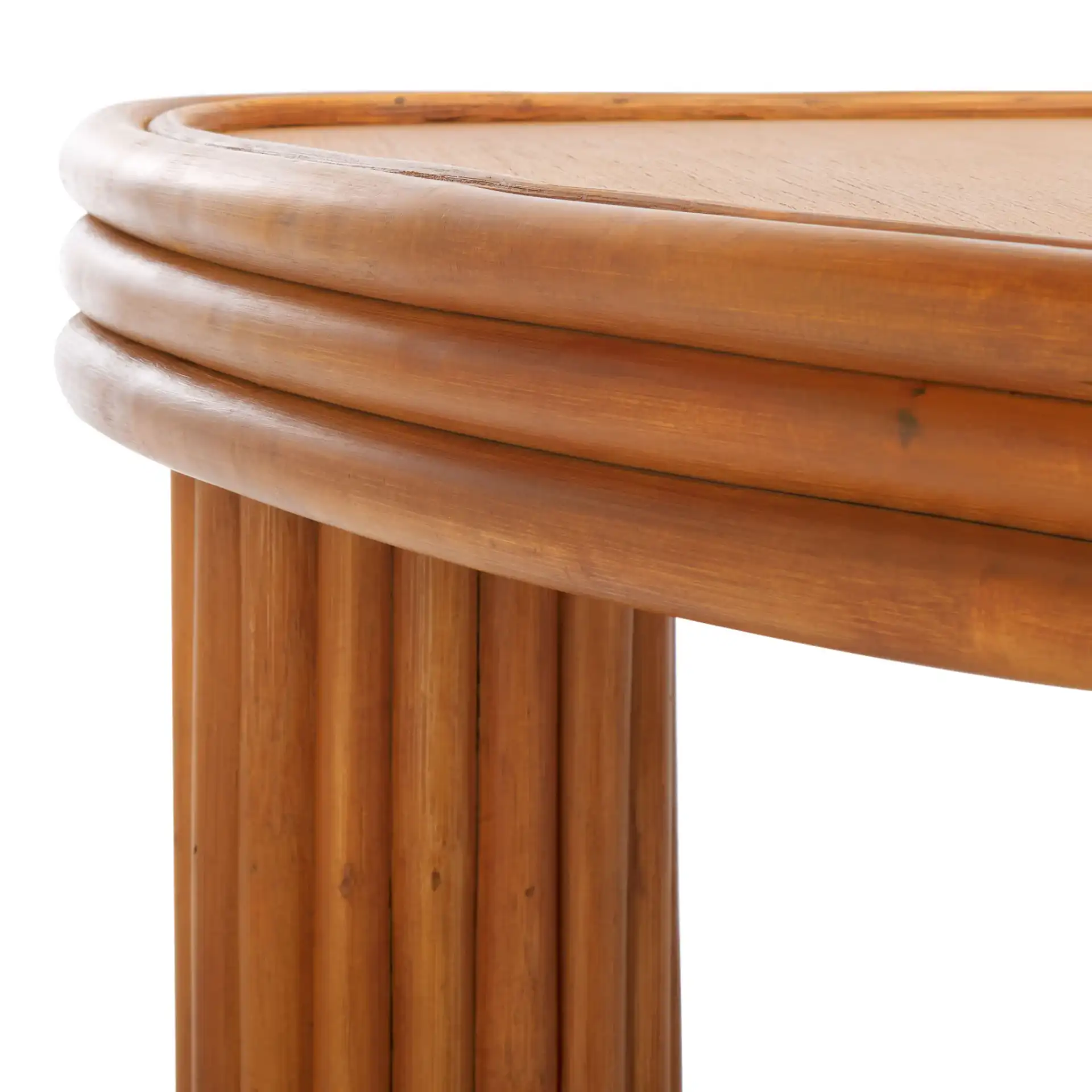 Bayard Rattan Triangle Coffee Table in Natural in a styled room