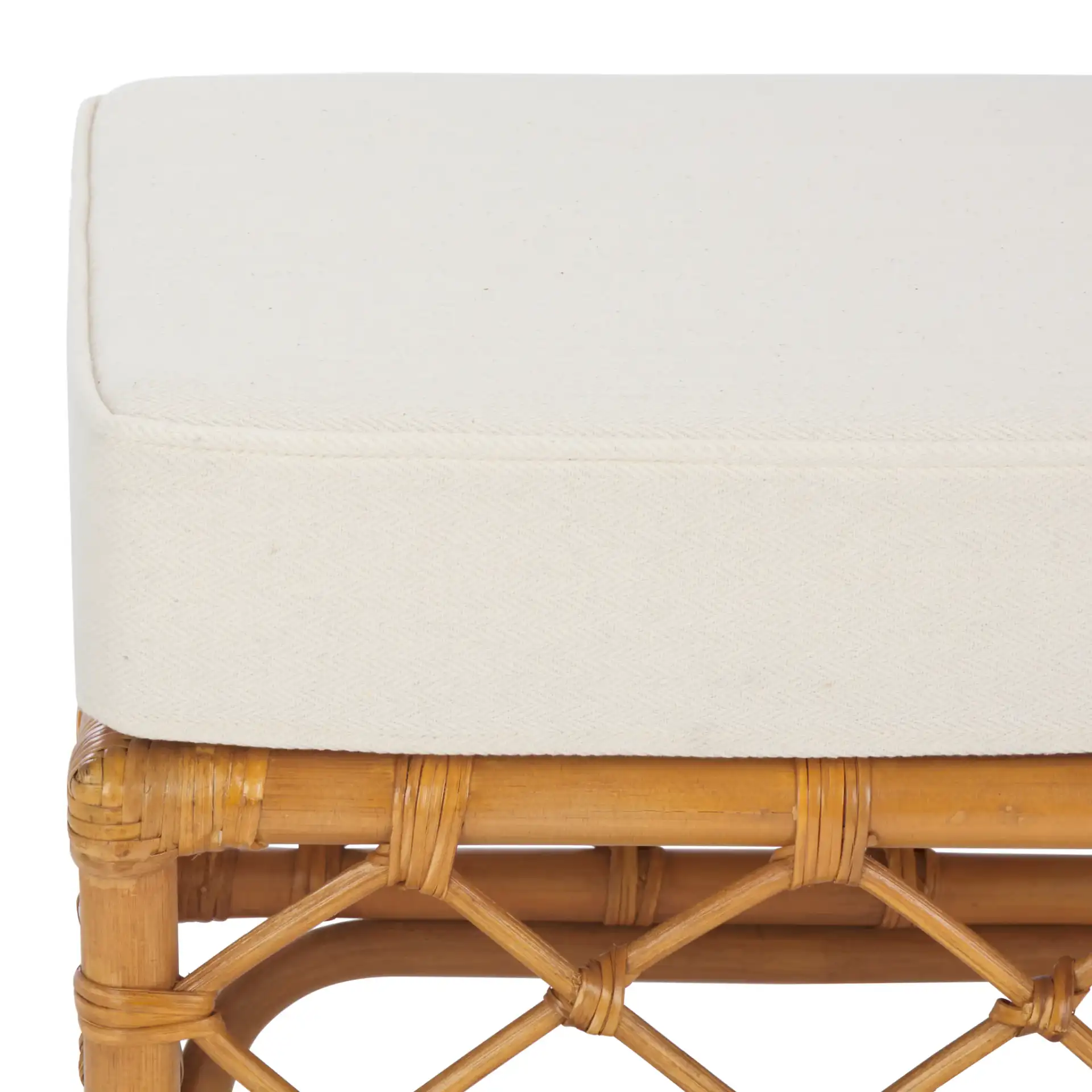 Cherilynn Rattan Pole Ottoman in Natural / White in a styled room