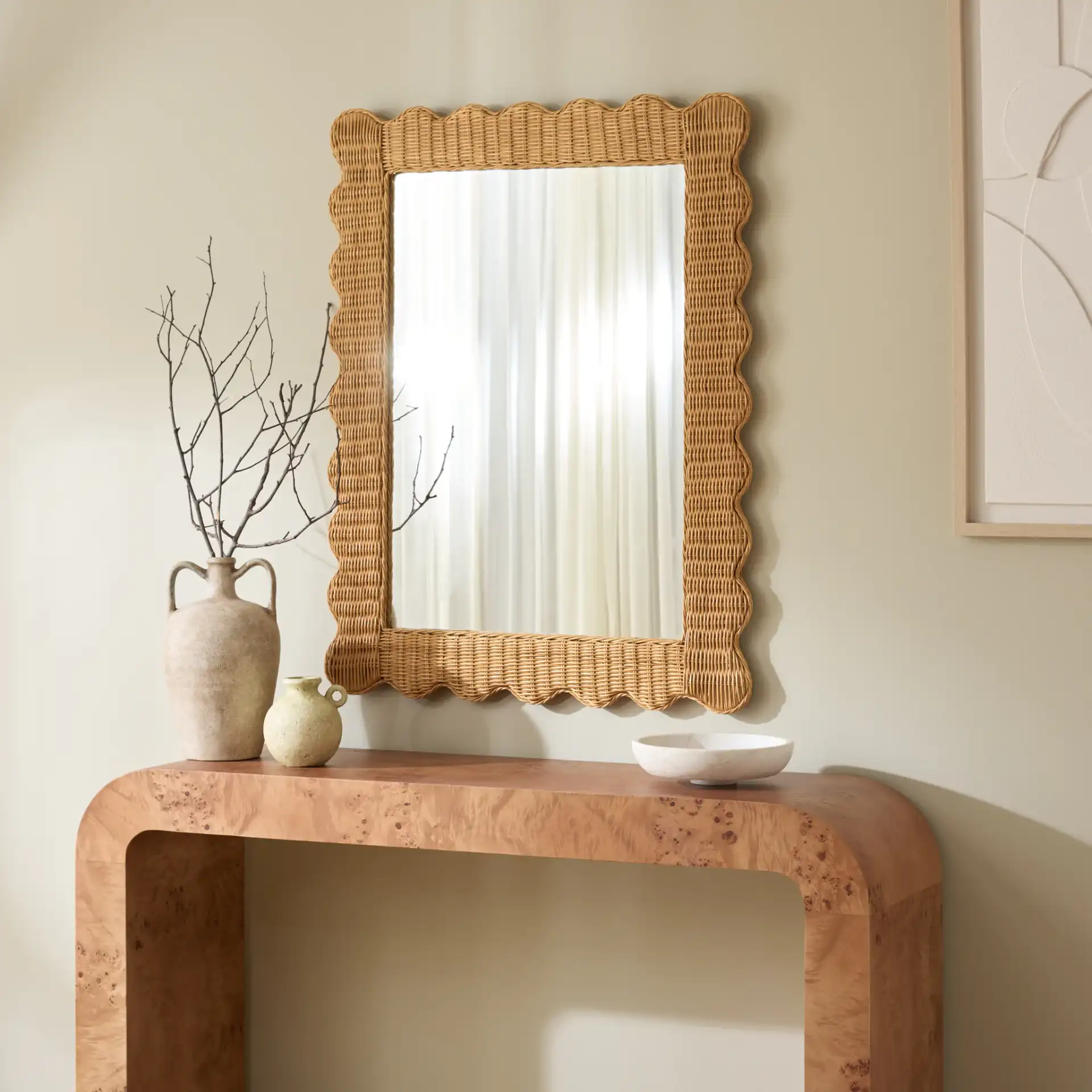 Glendetta Rattan 40-Inch Mirror in Natural in a styled room