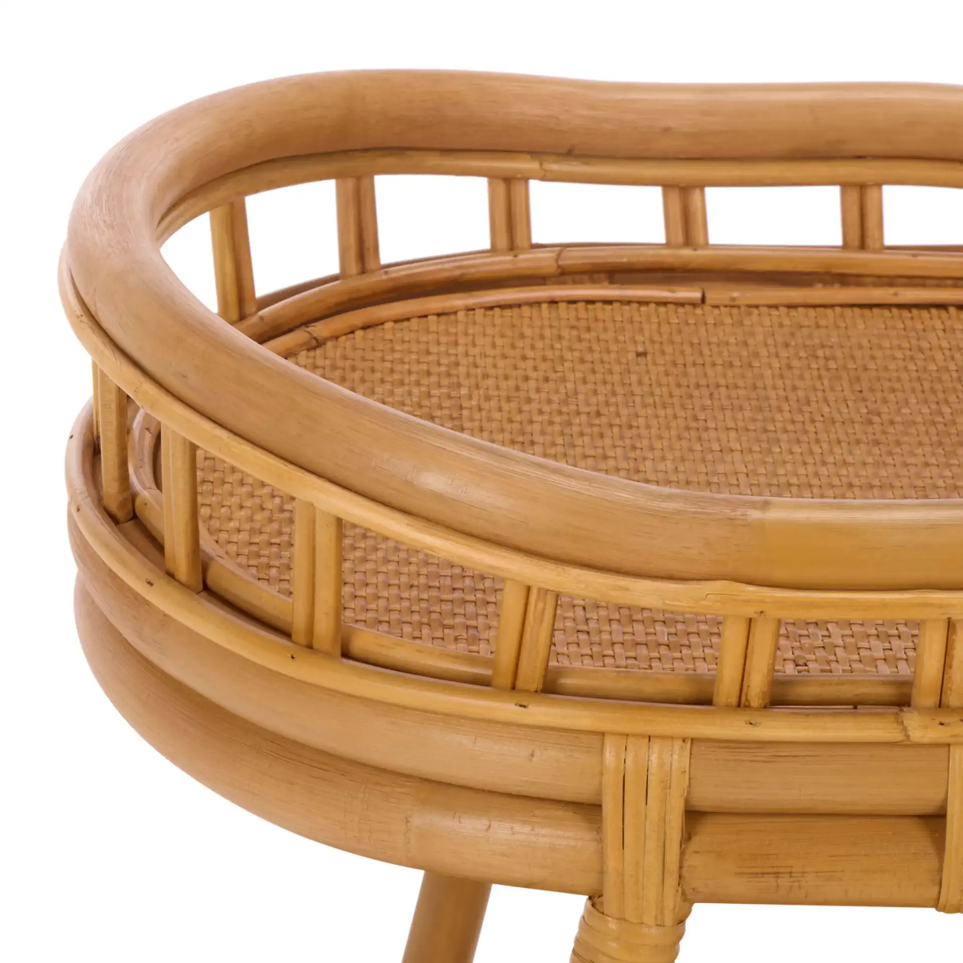Shayleen Rattan Pole Accent Table in Natural in a styled room