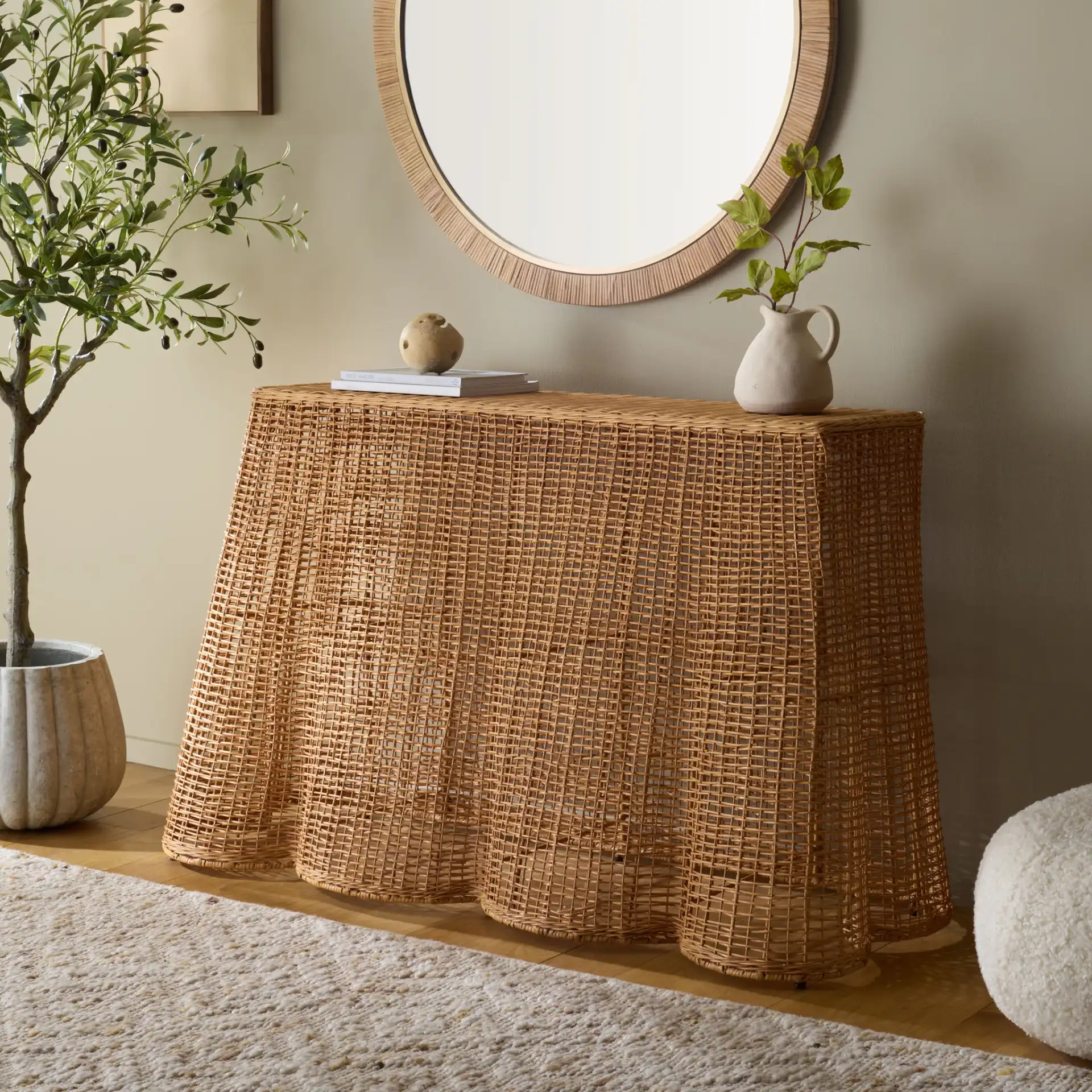 Jilliette Rattan Console Table in Natural in a styled room