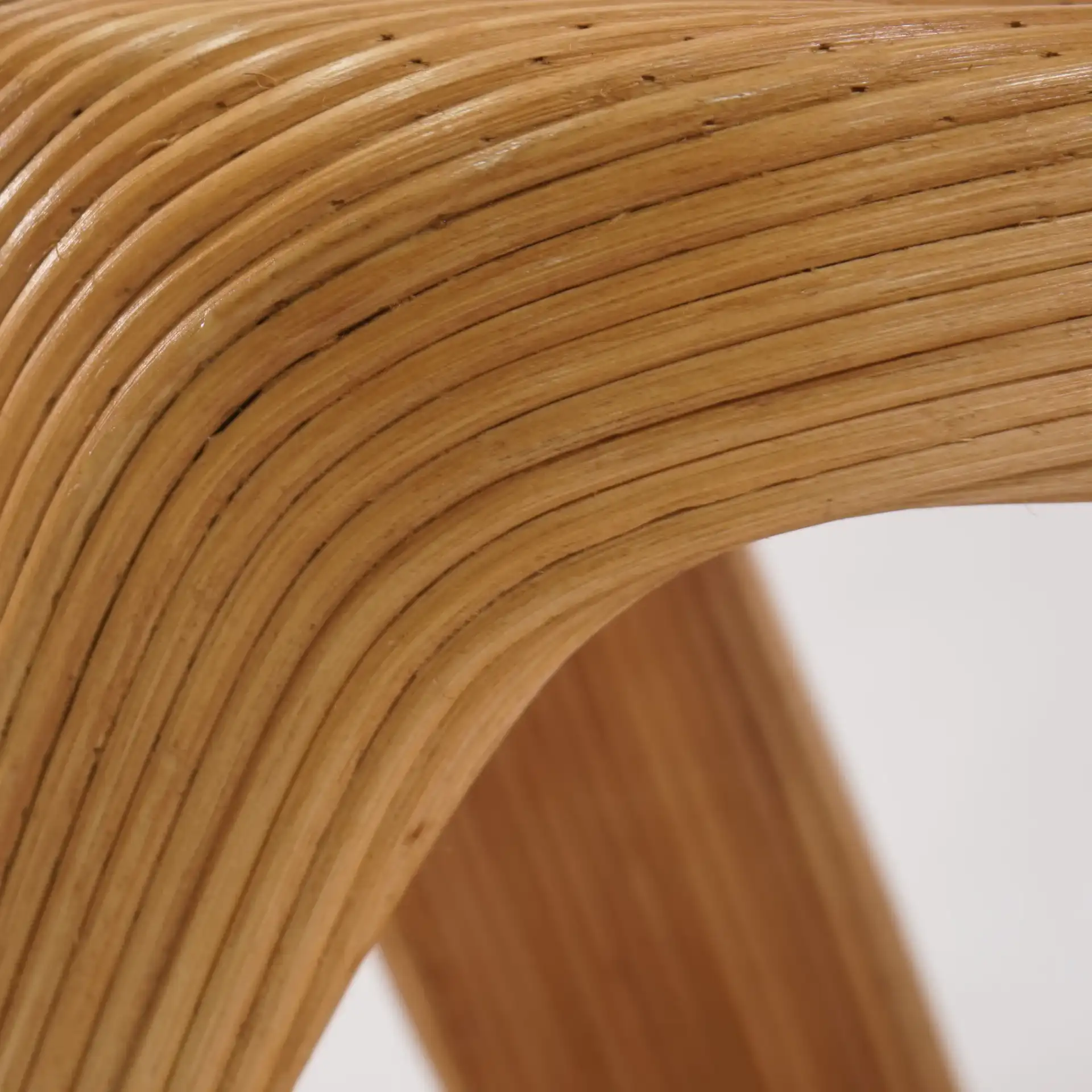 Tyleigh Round Rattan Accent Table in Natural in a styled room