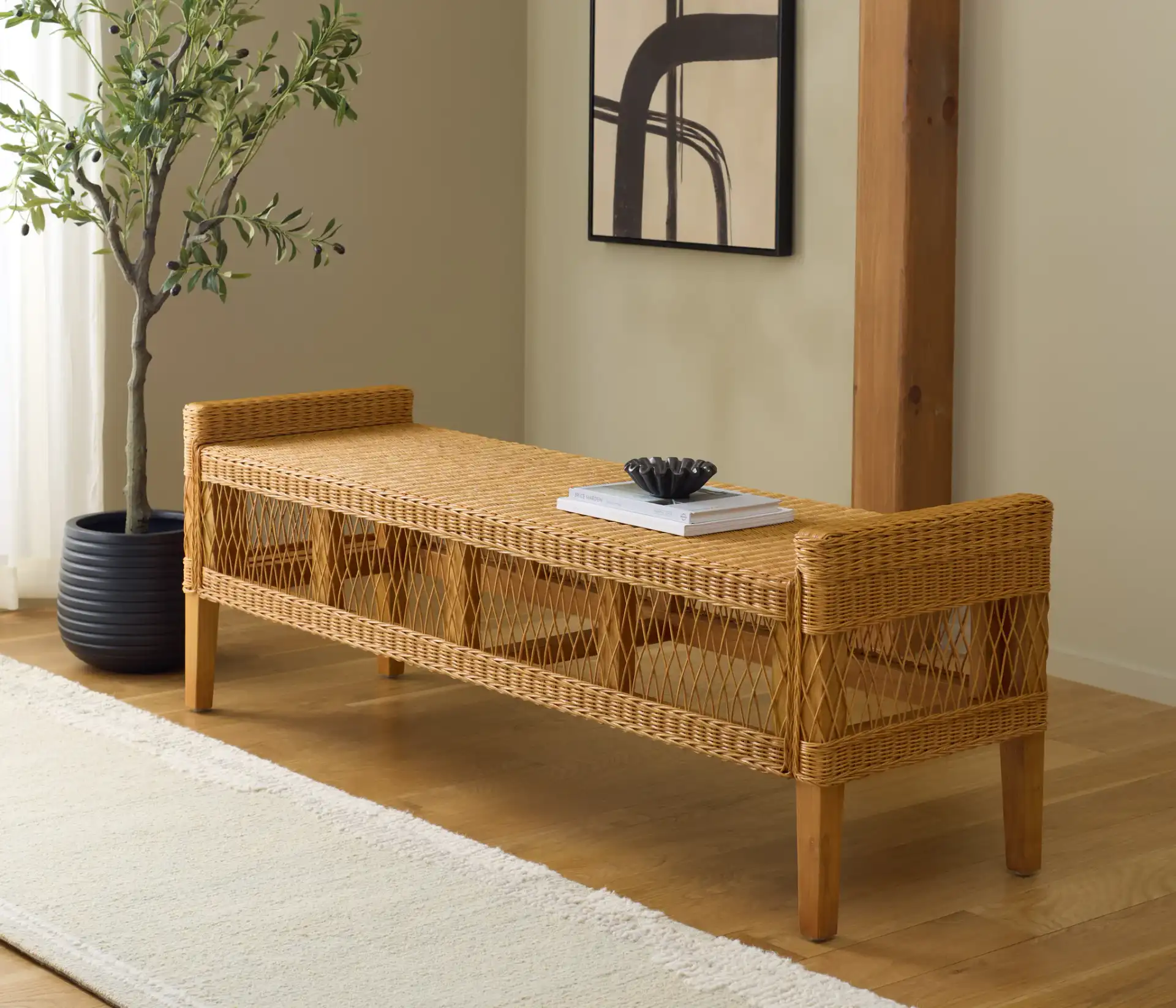 Jimmy Rattan Bench in Natural in a styled room