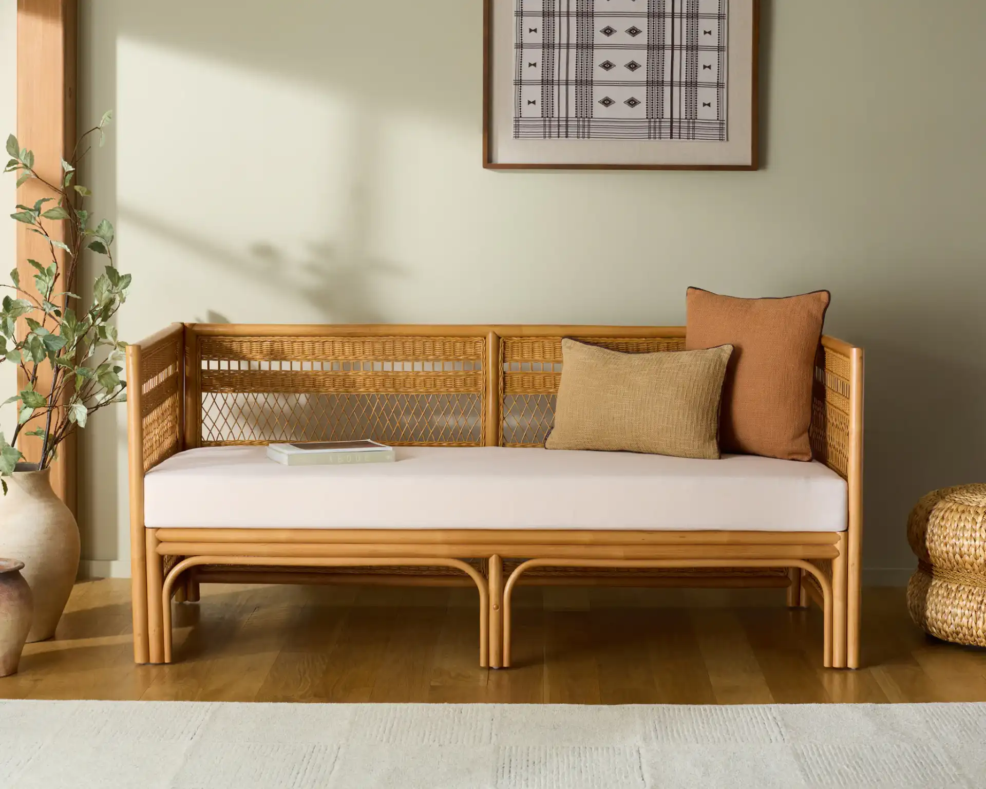 Shawnee Rattan Loveseat in Natural in a styled room