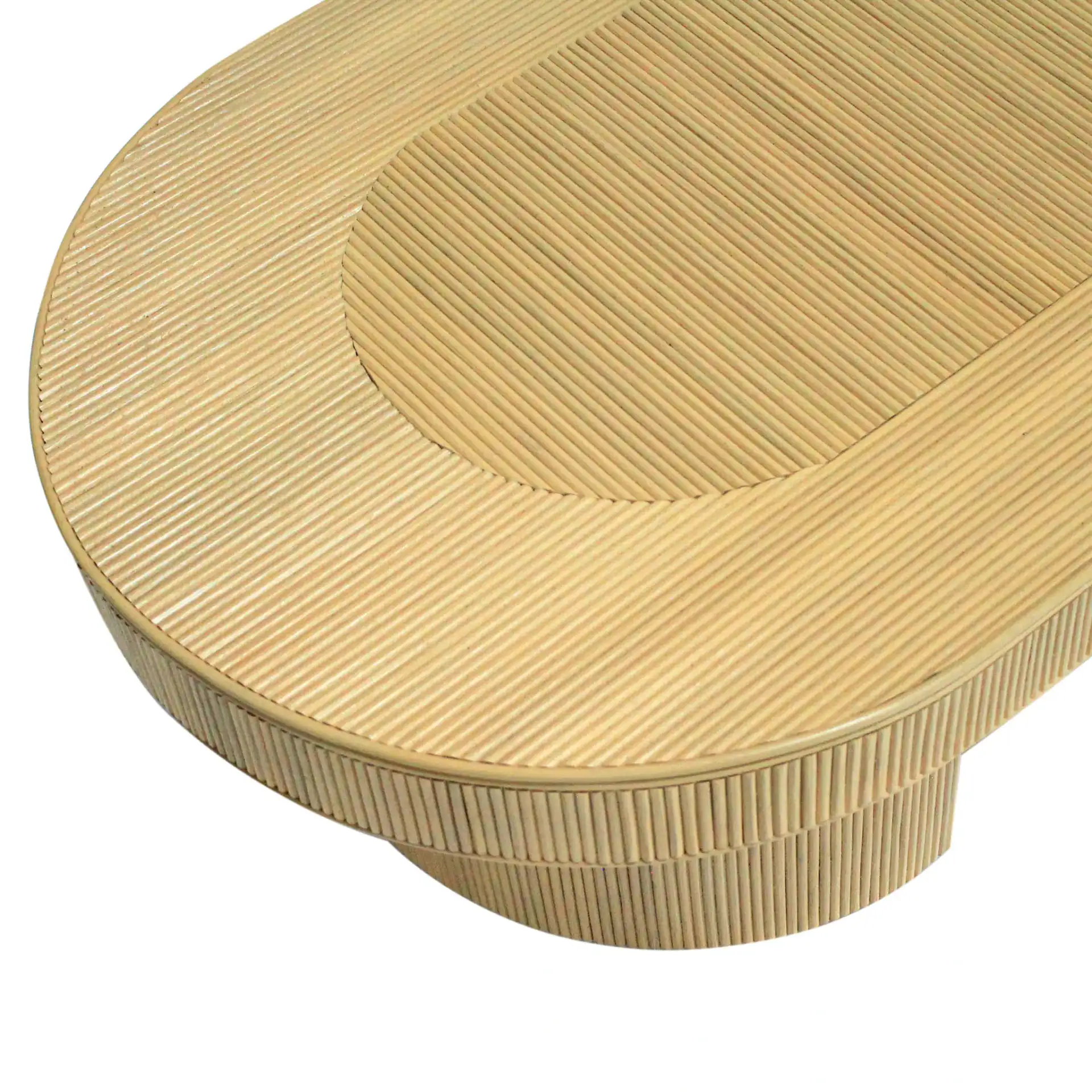 Kenzo Rattan Oval Coffee Table in Natural in a styled room