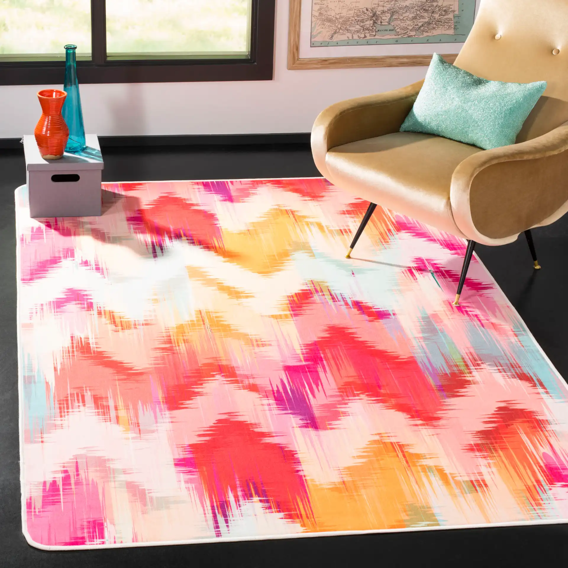 Daytona Chevron Washable Rug in Fuchsia / Orange in a styled room