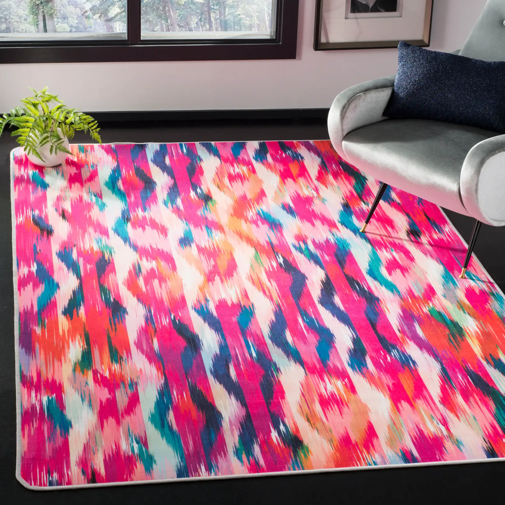 Daytona Ikat Washable Rug in Fuchsia / Purple in a styled room