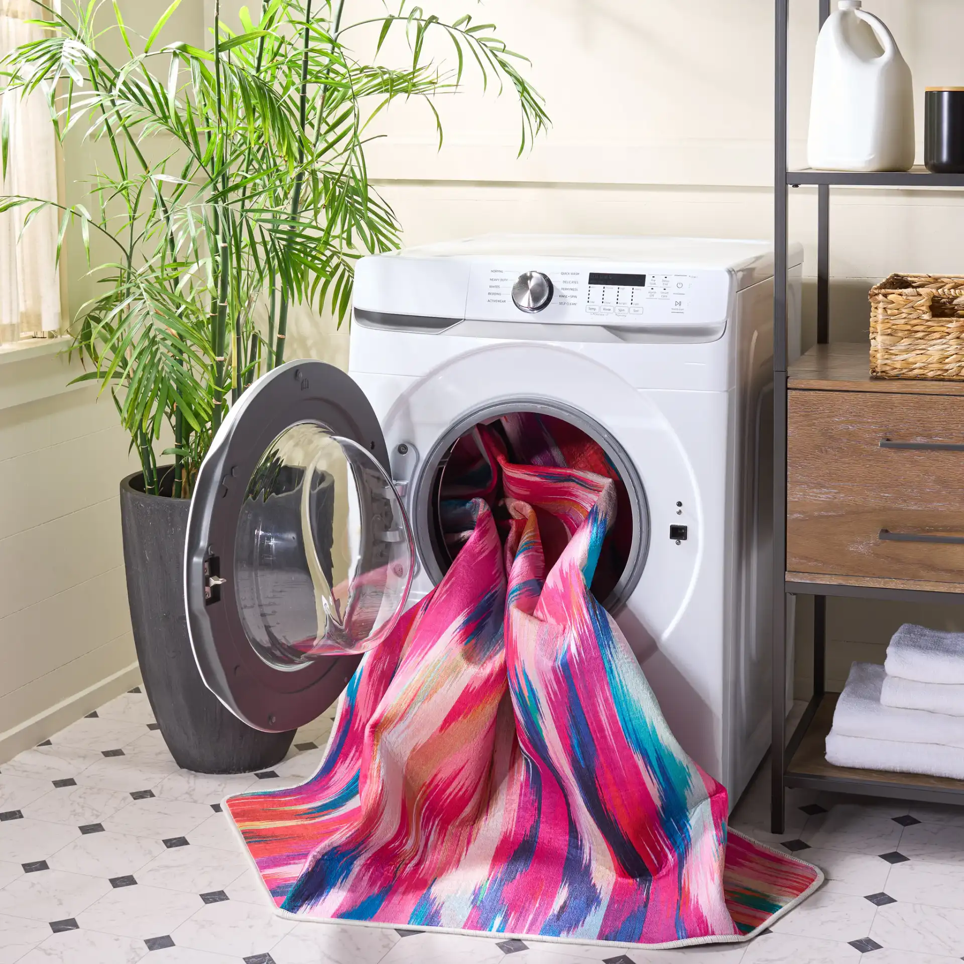 Daytona Ikat Washable Rug in Fuchsia / Purple in a styled room
