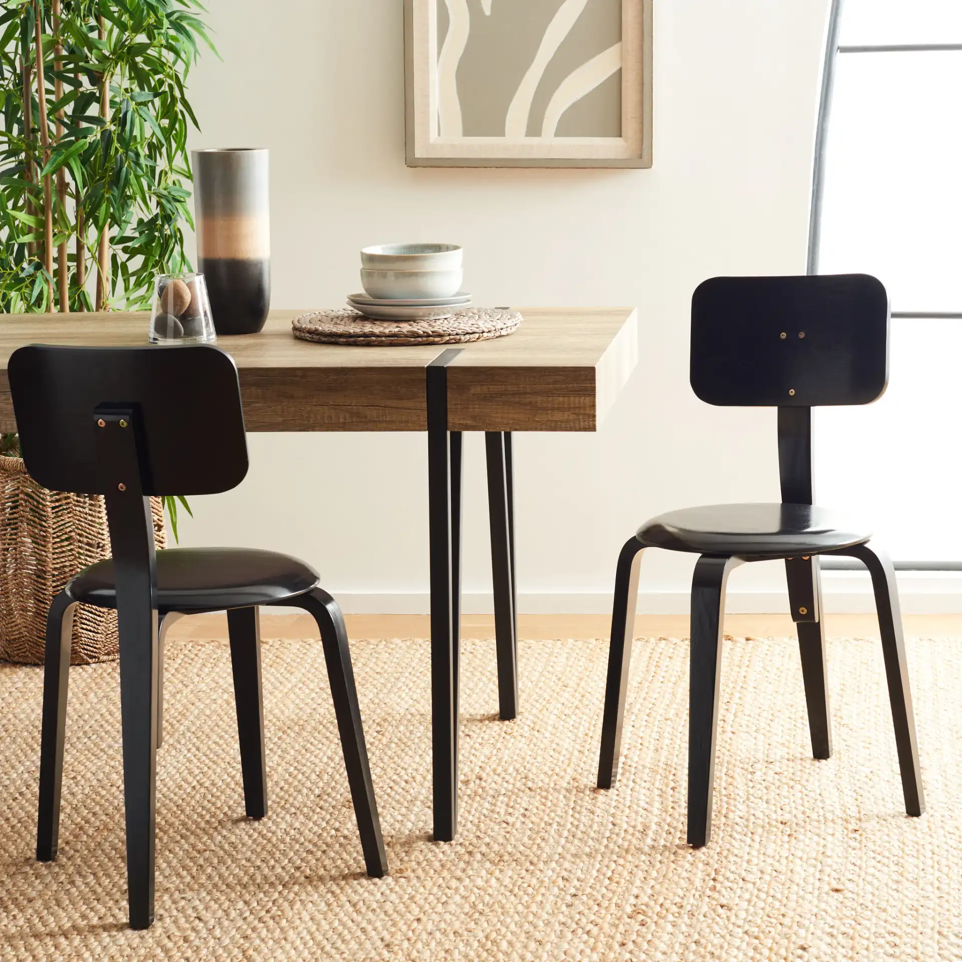Luella Stackable Dining Chair (Set of 2) in Black in a styled room