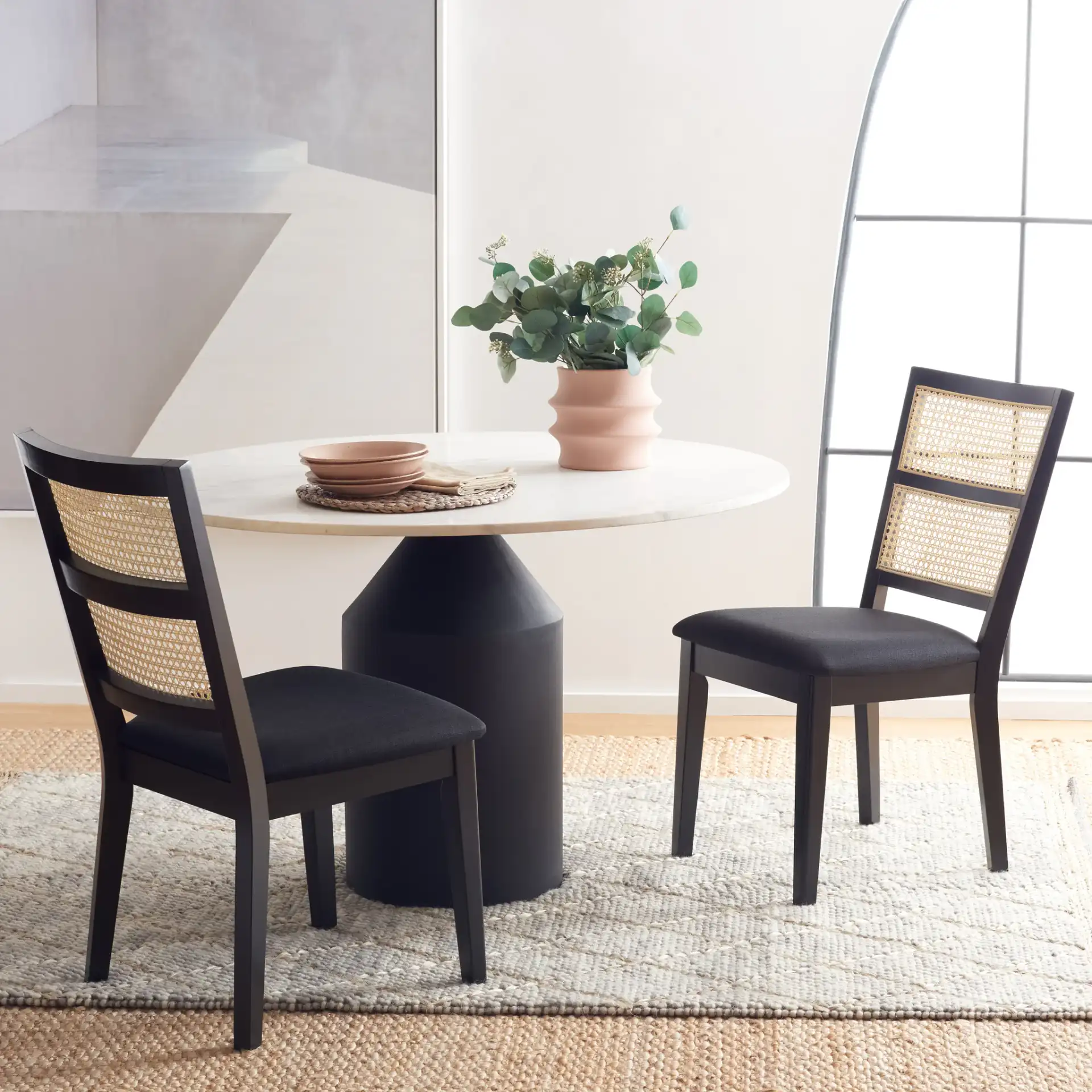 Toril Dining Chair (Set of 2) in Black in a styled room