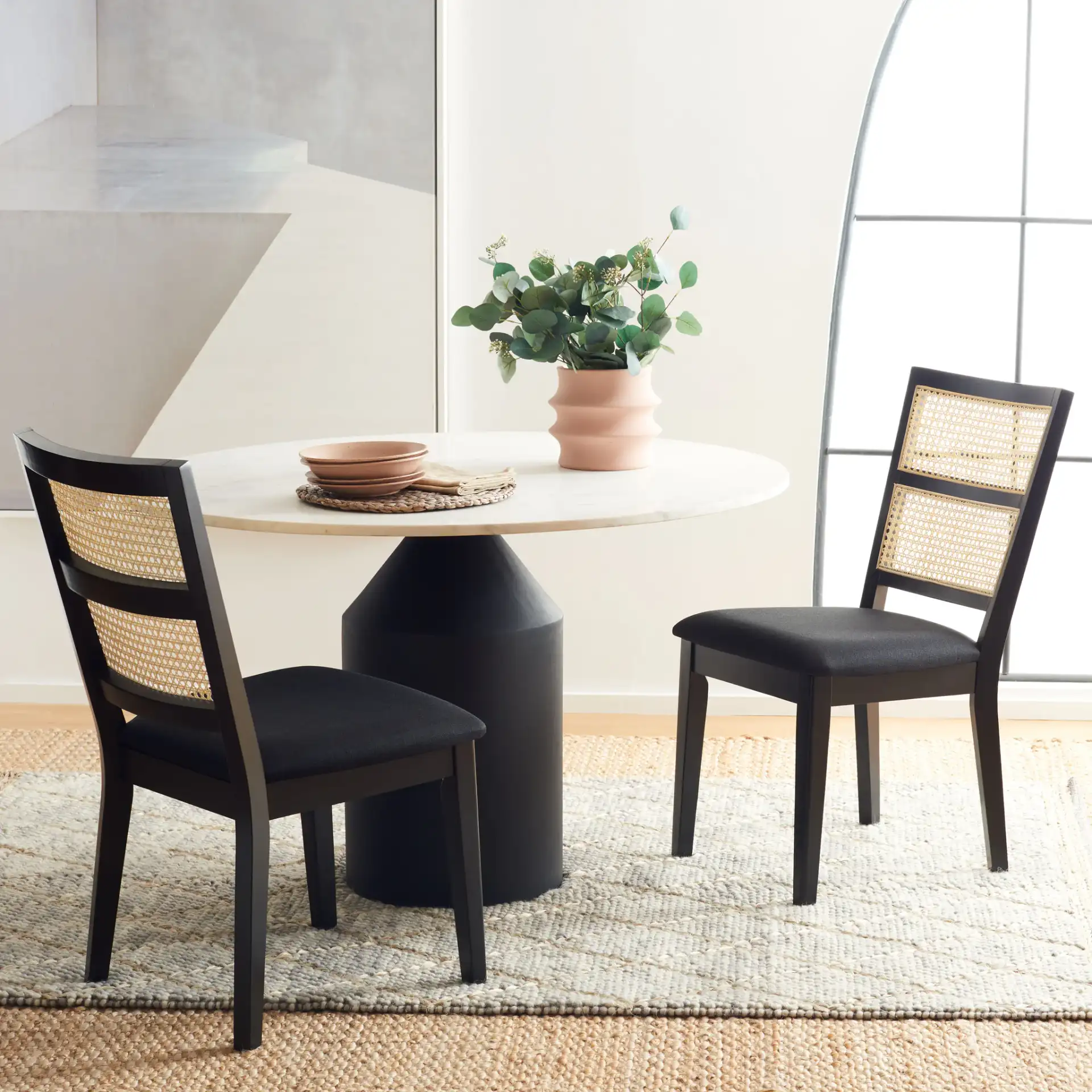 Toril Dining Chair (Set of 2) in Black in a styled room