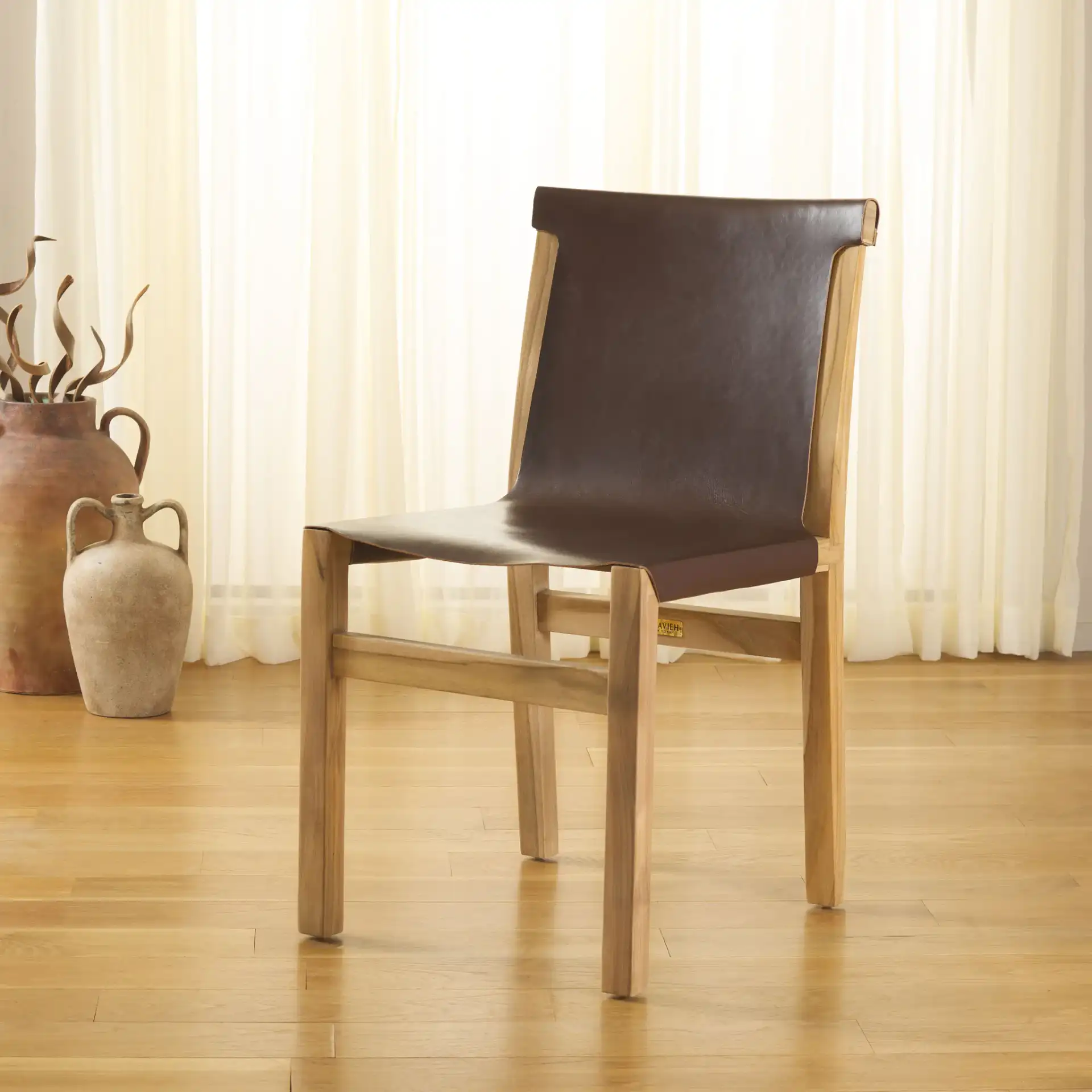 Arian Dining Chair in Cognac / Natural in a styled room