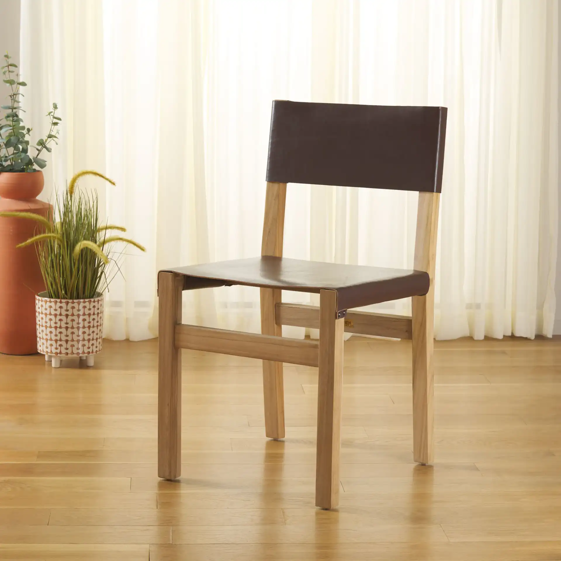 Romee Dining Chair in Cognac / Natural in a styled room