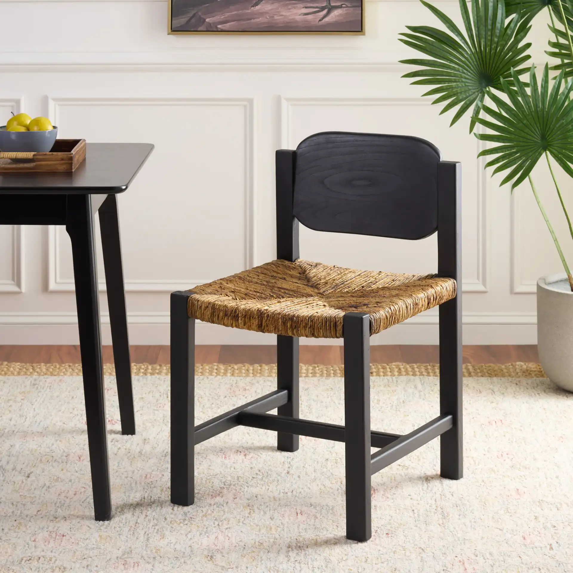 Aristedes Dining Chair in Banana Natural / Black in a styled room