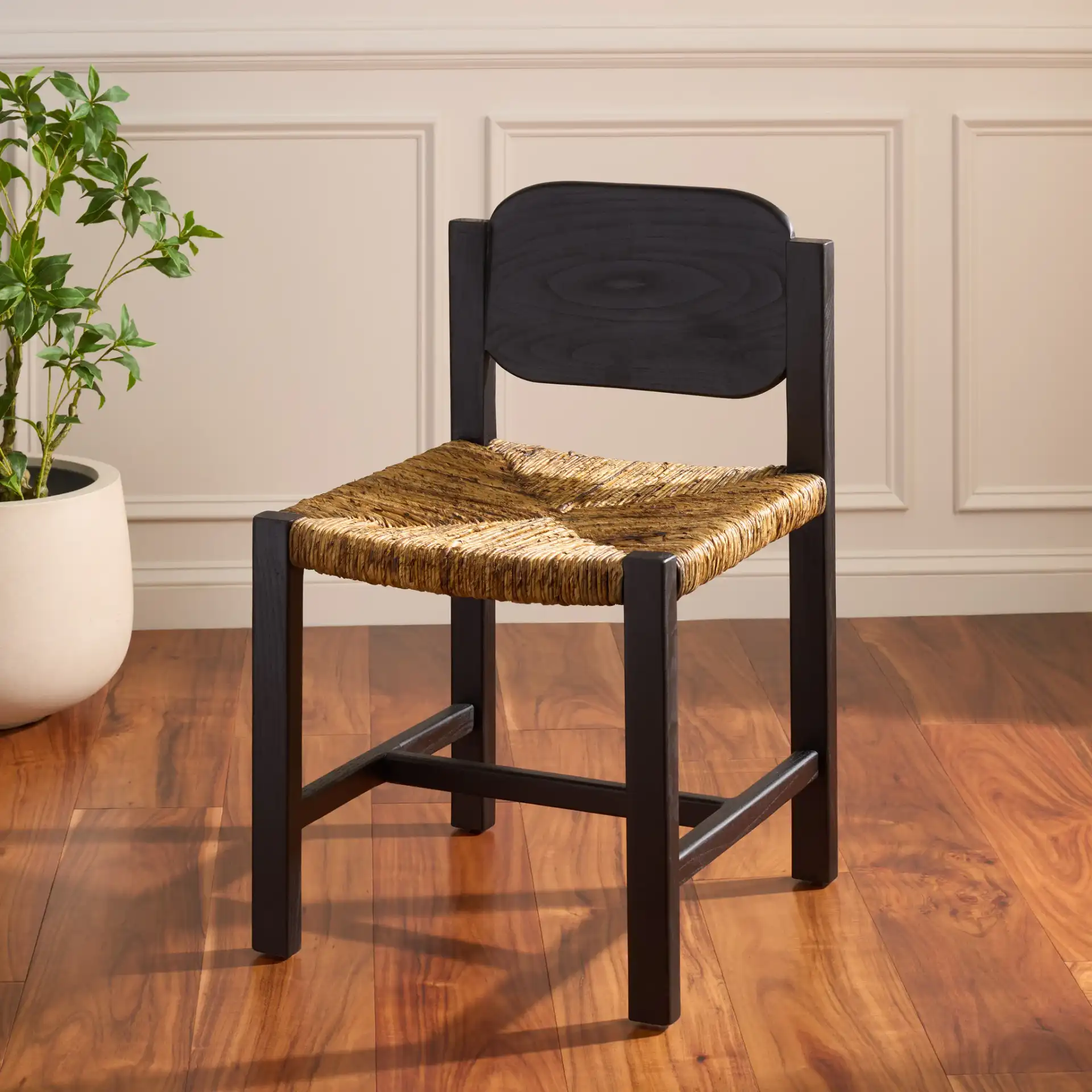 Aristedes Dining Chair in Banana Natural / Black in a styled room
