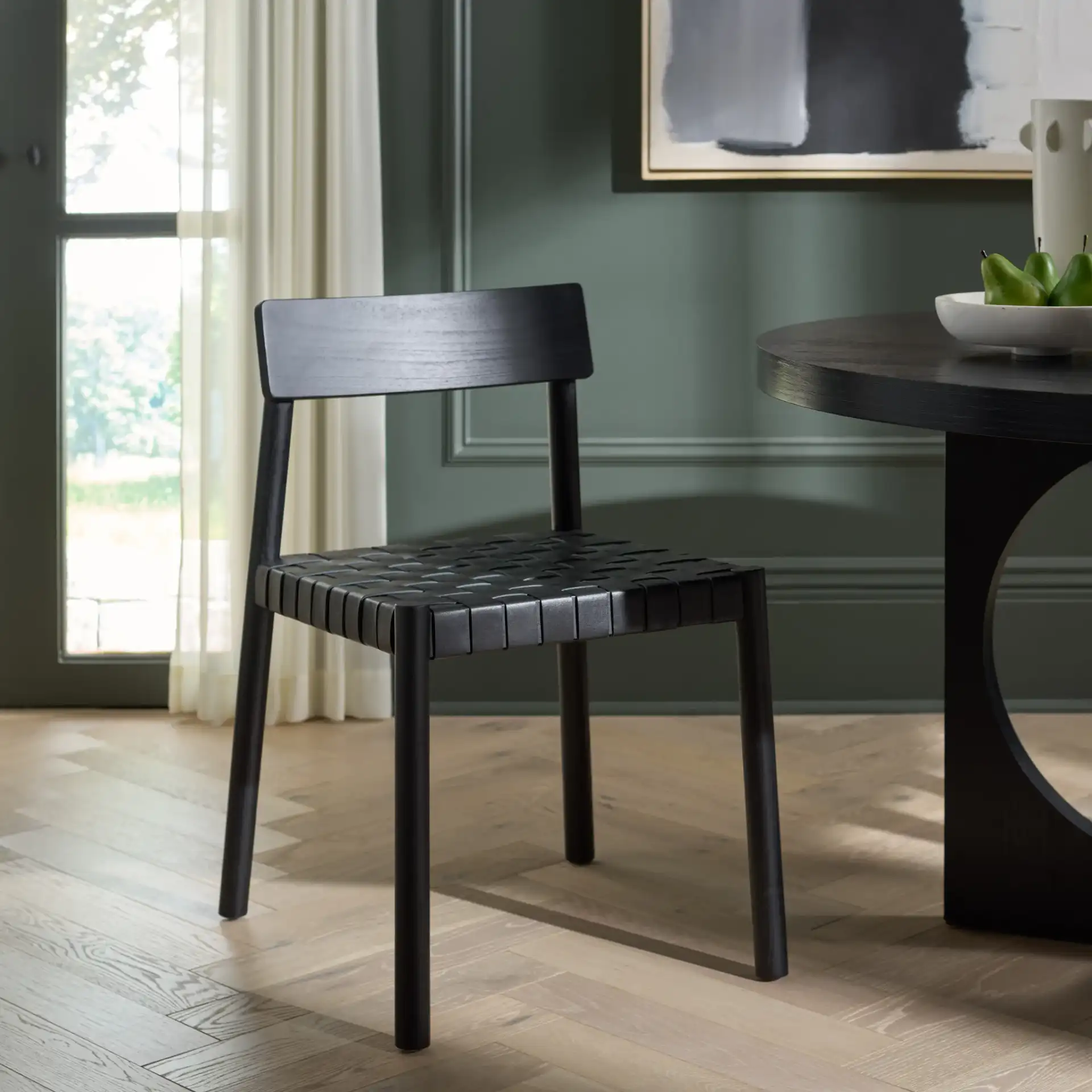 Tyde Dining Chair in Black in a styled room