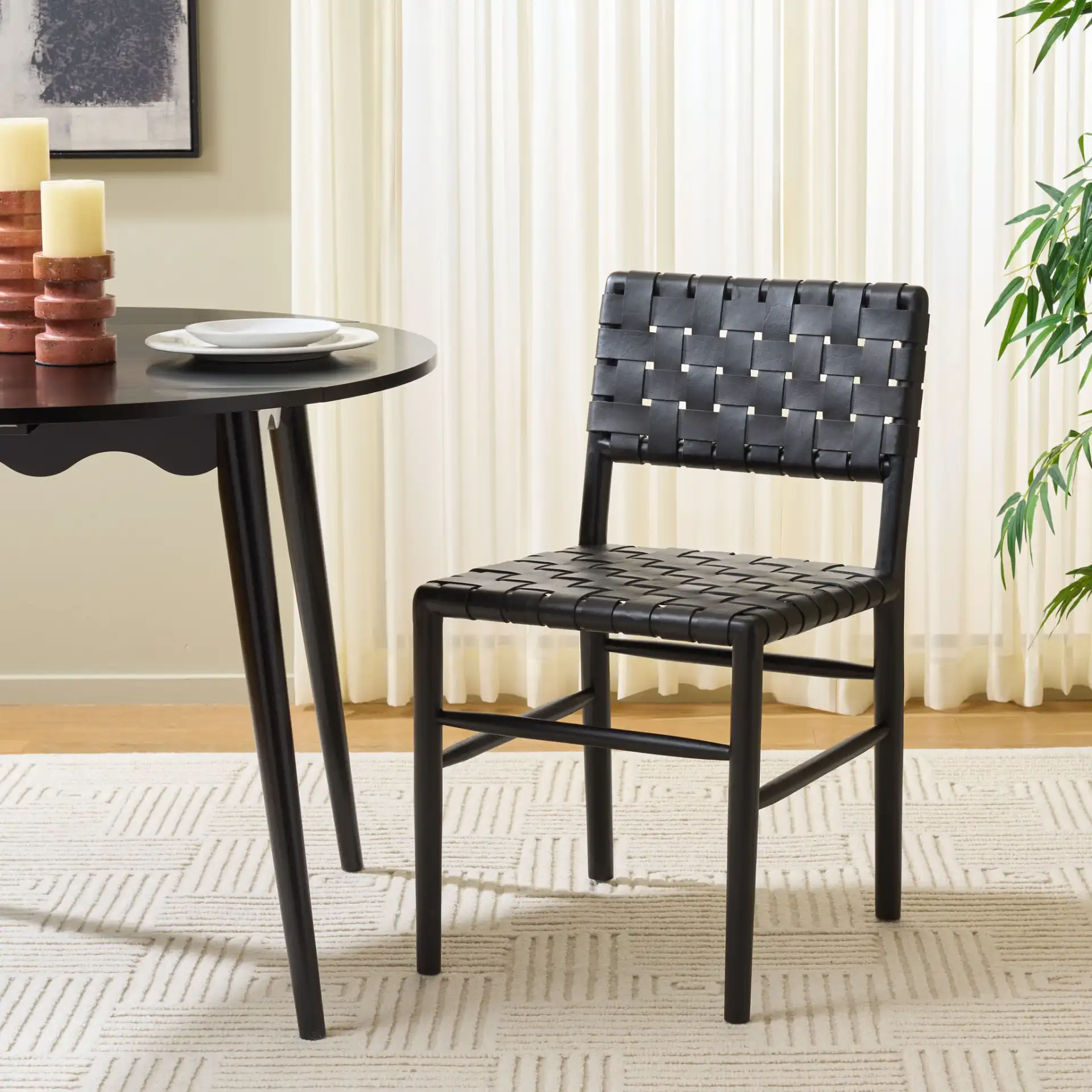 Kaiber Dining Chair in Black in a styled room