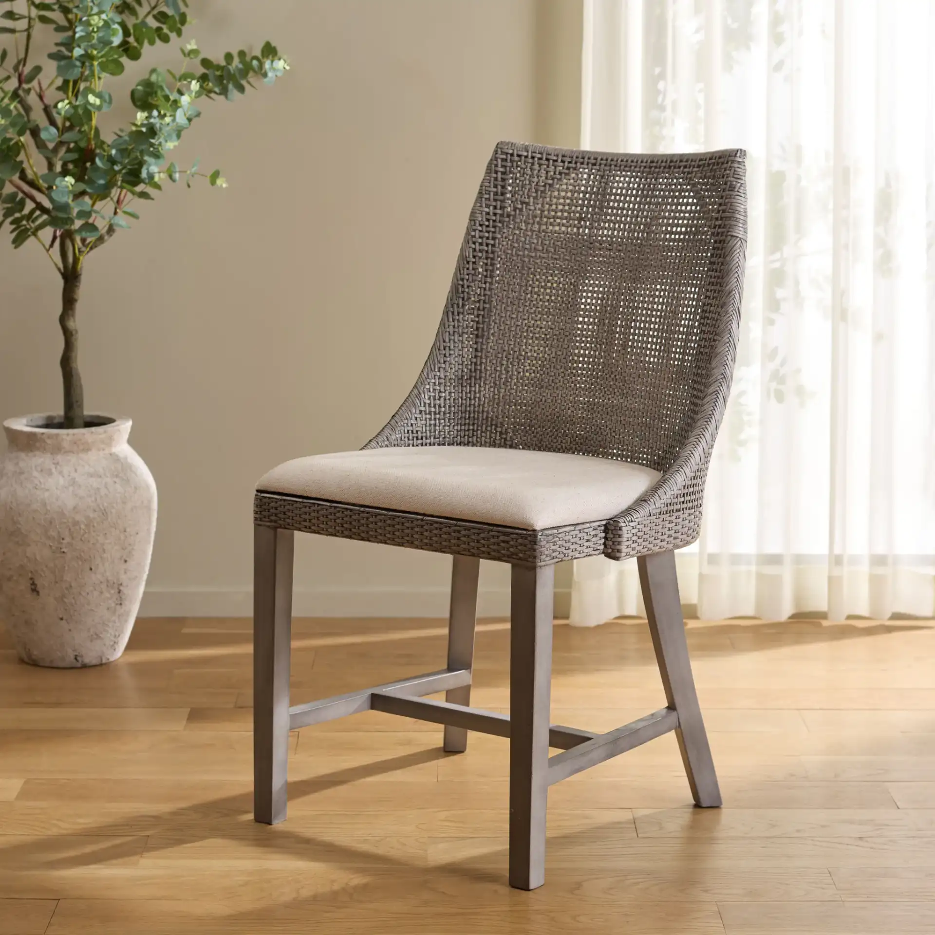 Daylon Dining Chair in Grey / White in a styled room