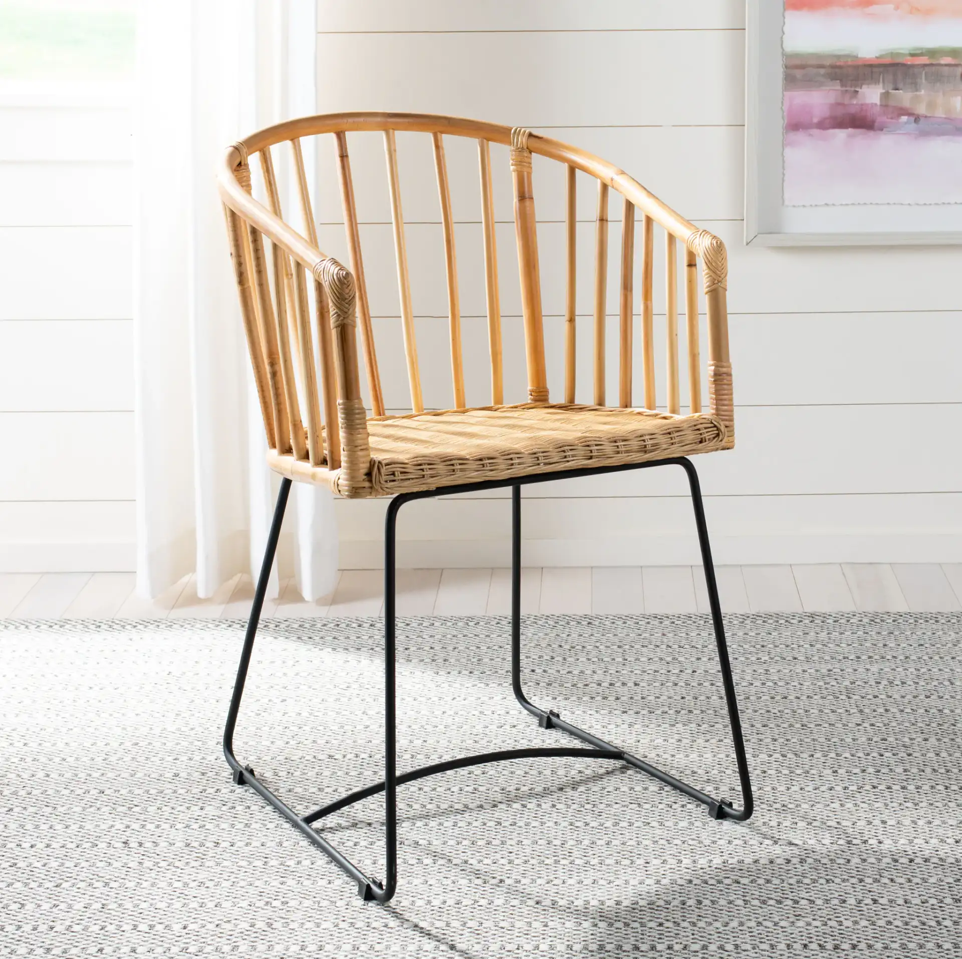 Siena Rattan Dining Chair in Natural / Black in a styled room