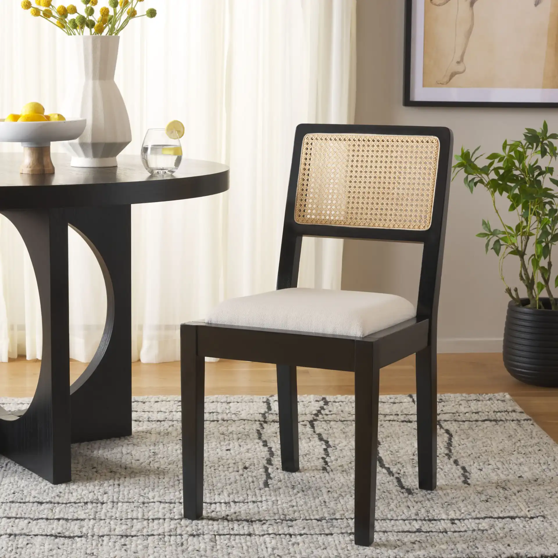 Suzetta Dining Chair in Natural / White in a styled room