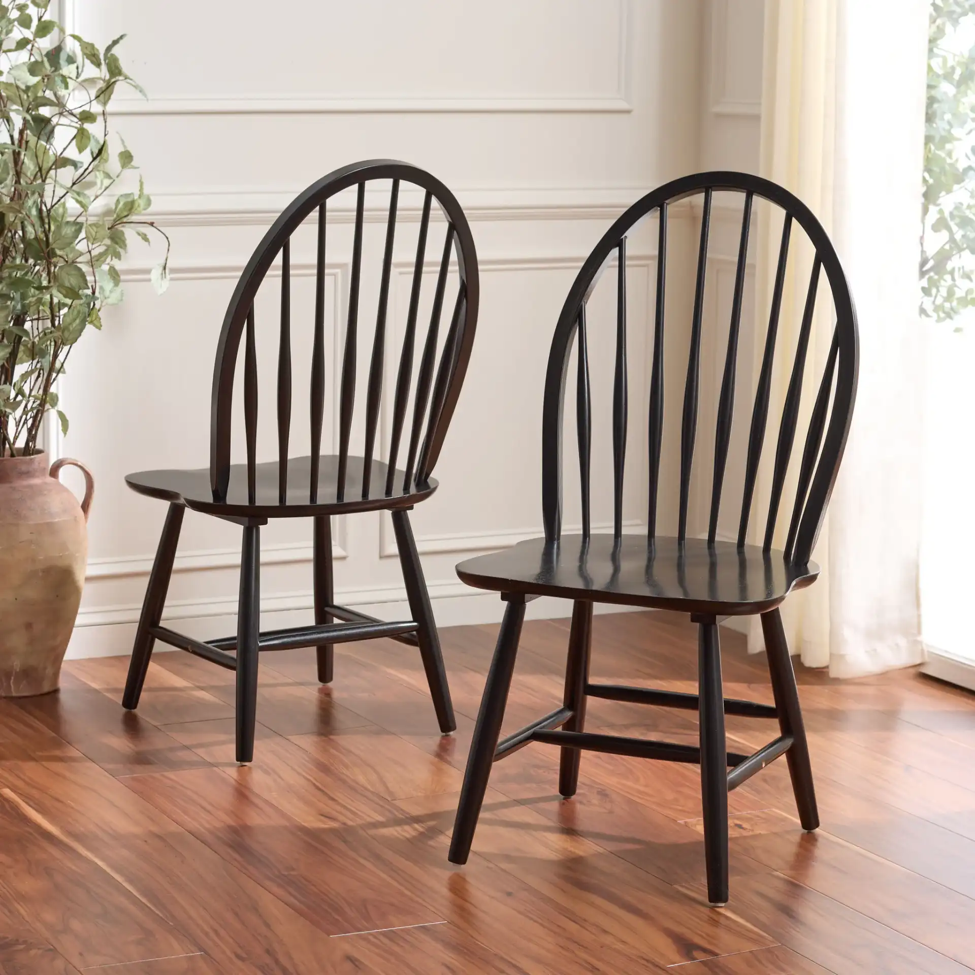 Wendall Spindle Dining Chairs (Set of 2) in Black in a styled room
