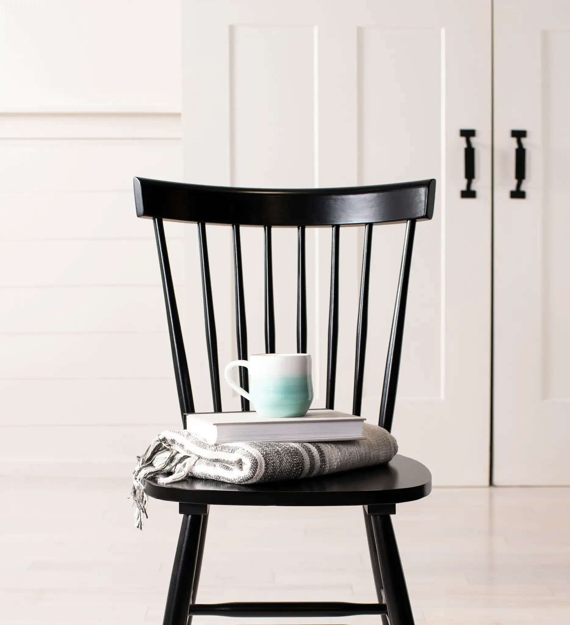 Novalyn Dining Chairs (Set Of 2) in Black in a styled room