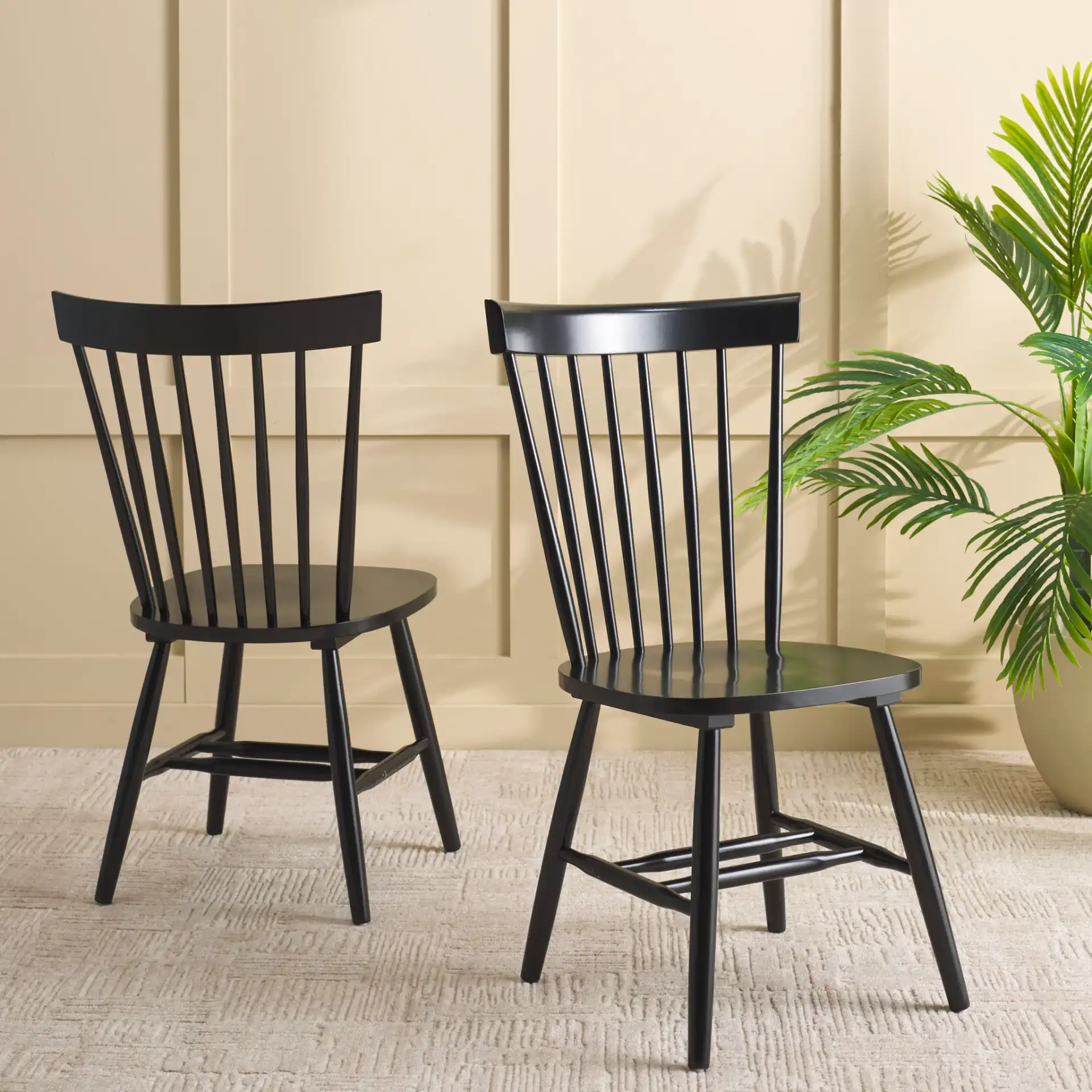 Novalyn Dining Chairs (Set Of 2) in Black in a styled room