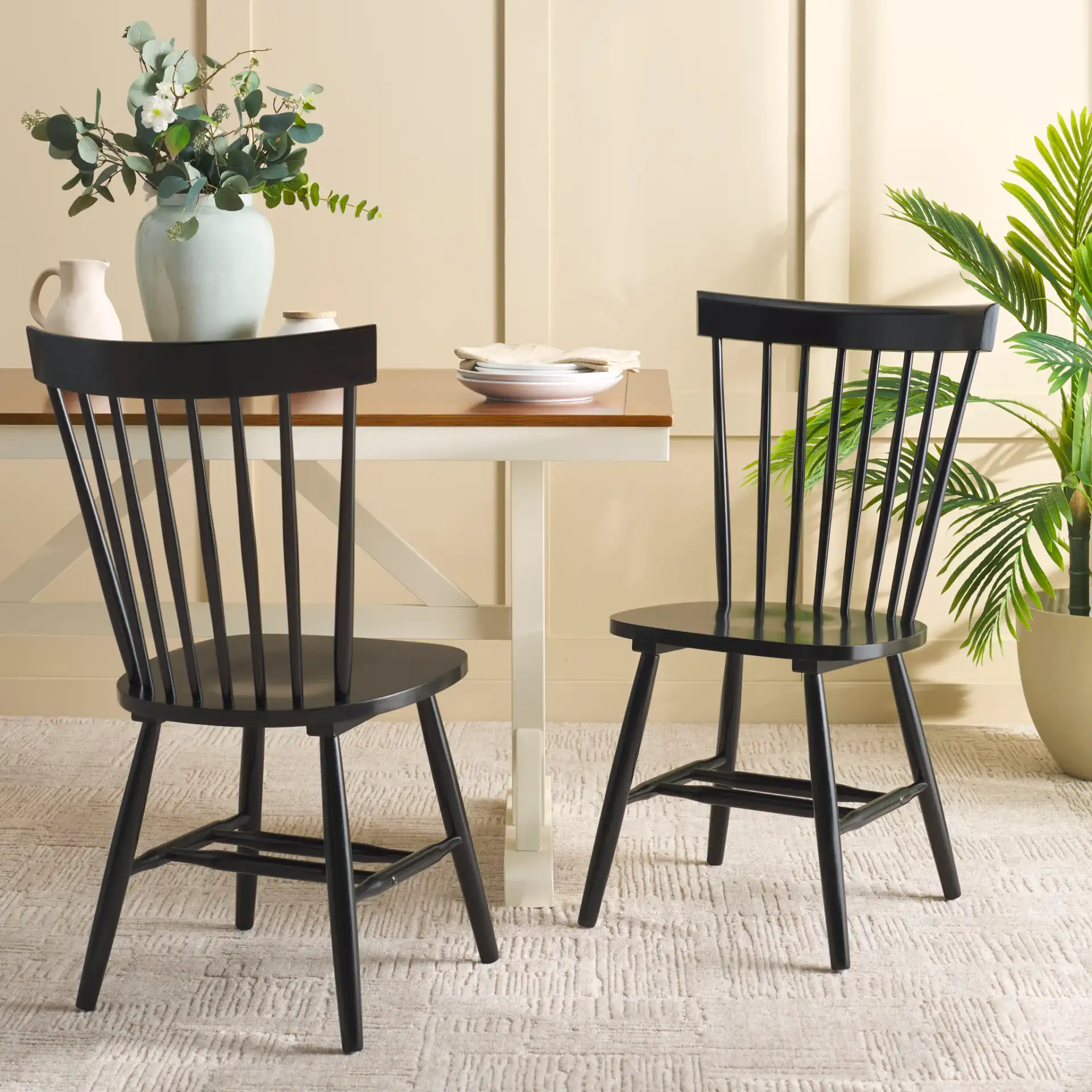 Novalyn Dining Chairs (Set Of 2) in Black in a styled room