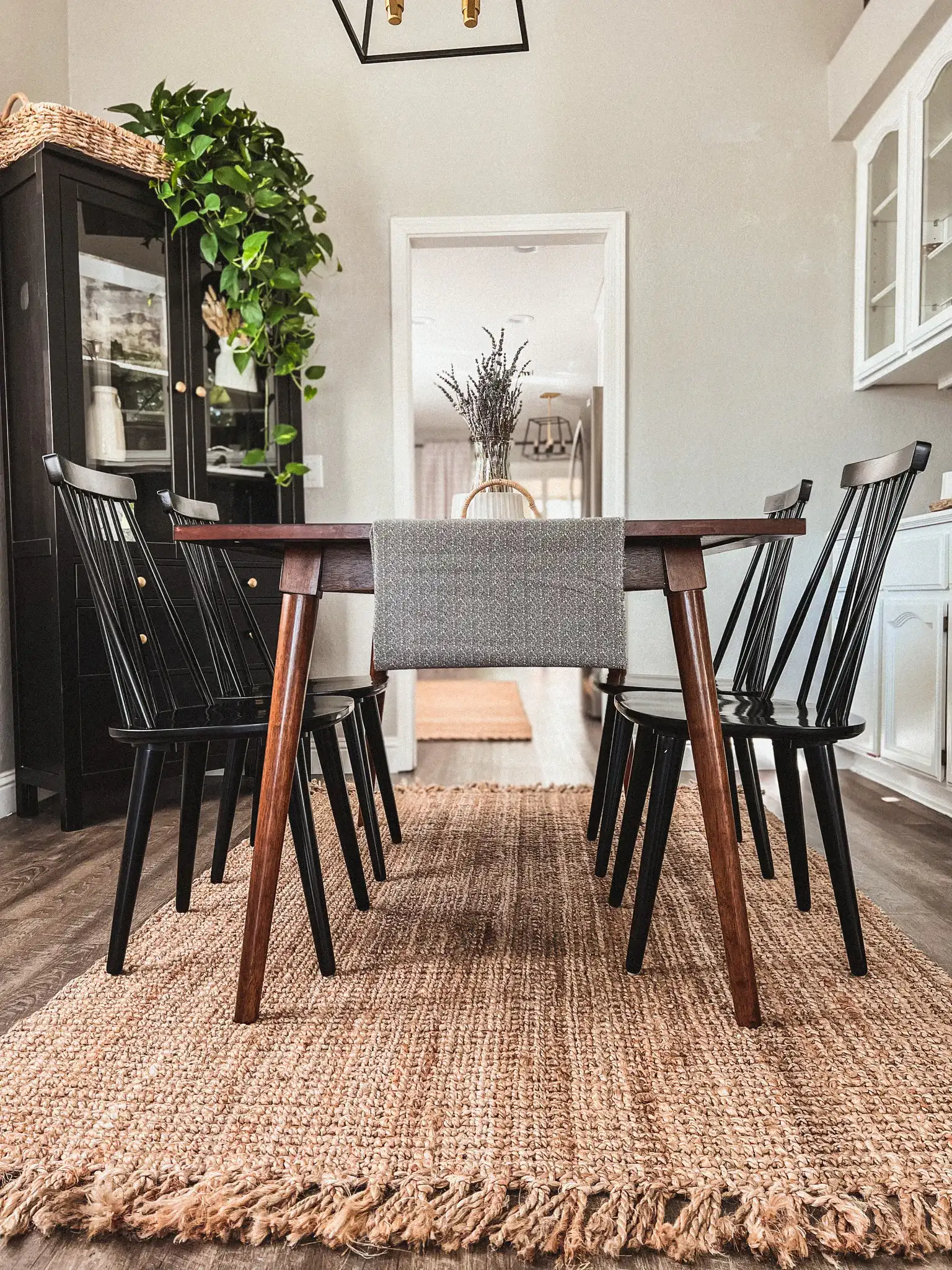 Raylin Dining Chairs (Set of 2) in Black in a styled room
