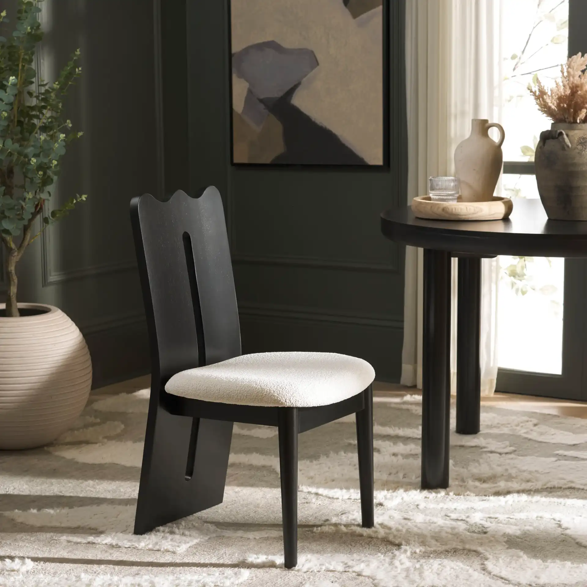 Kieran Dining Chair in Cream / Black in a styled room