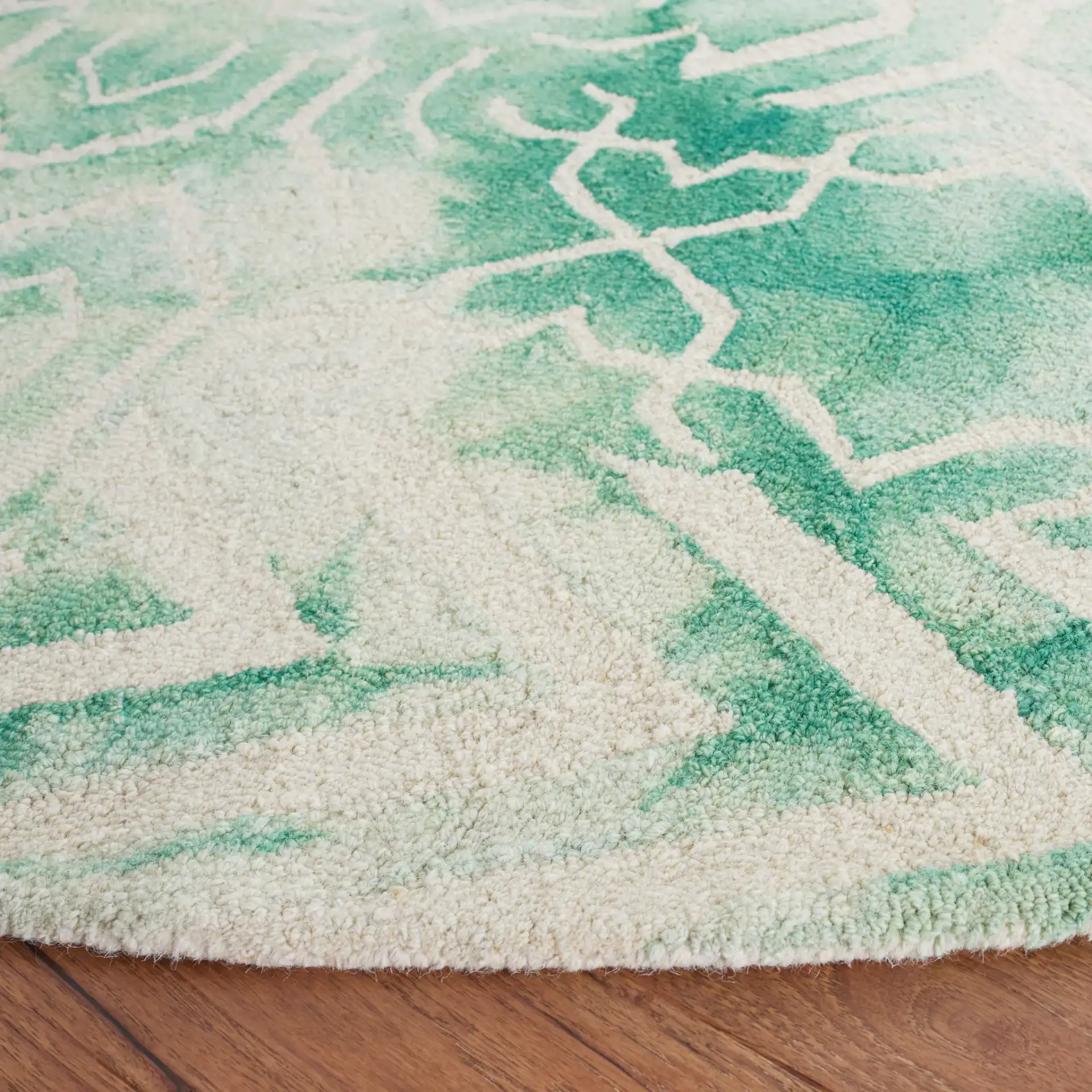 Dip Dye Mixed Geometric Hand-Tufted Wool Rug in Green / Ivory in a styled room