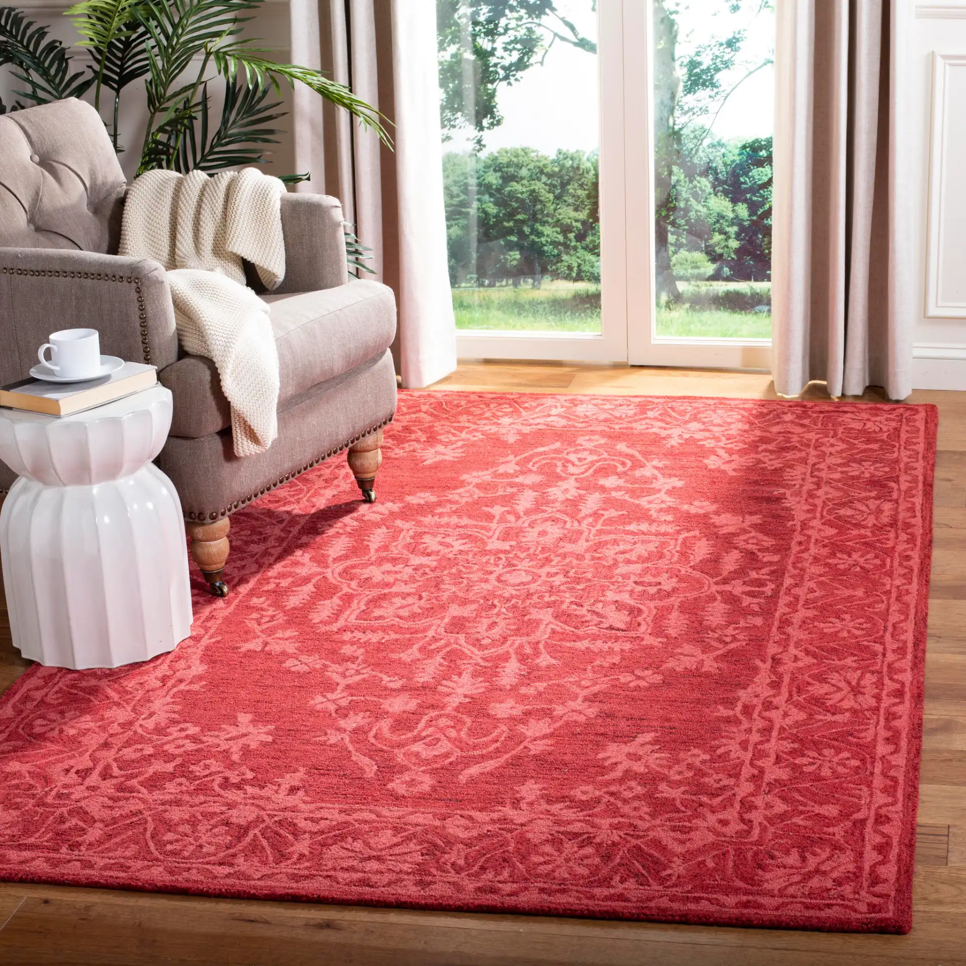 Dip Dye Bordered Medallion Hand-Tufted Wool Rug in Red in a styled room
