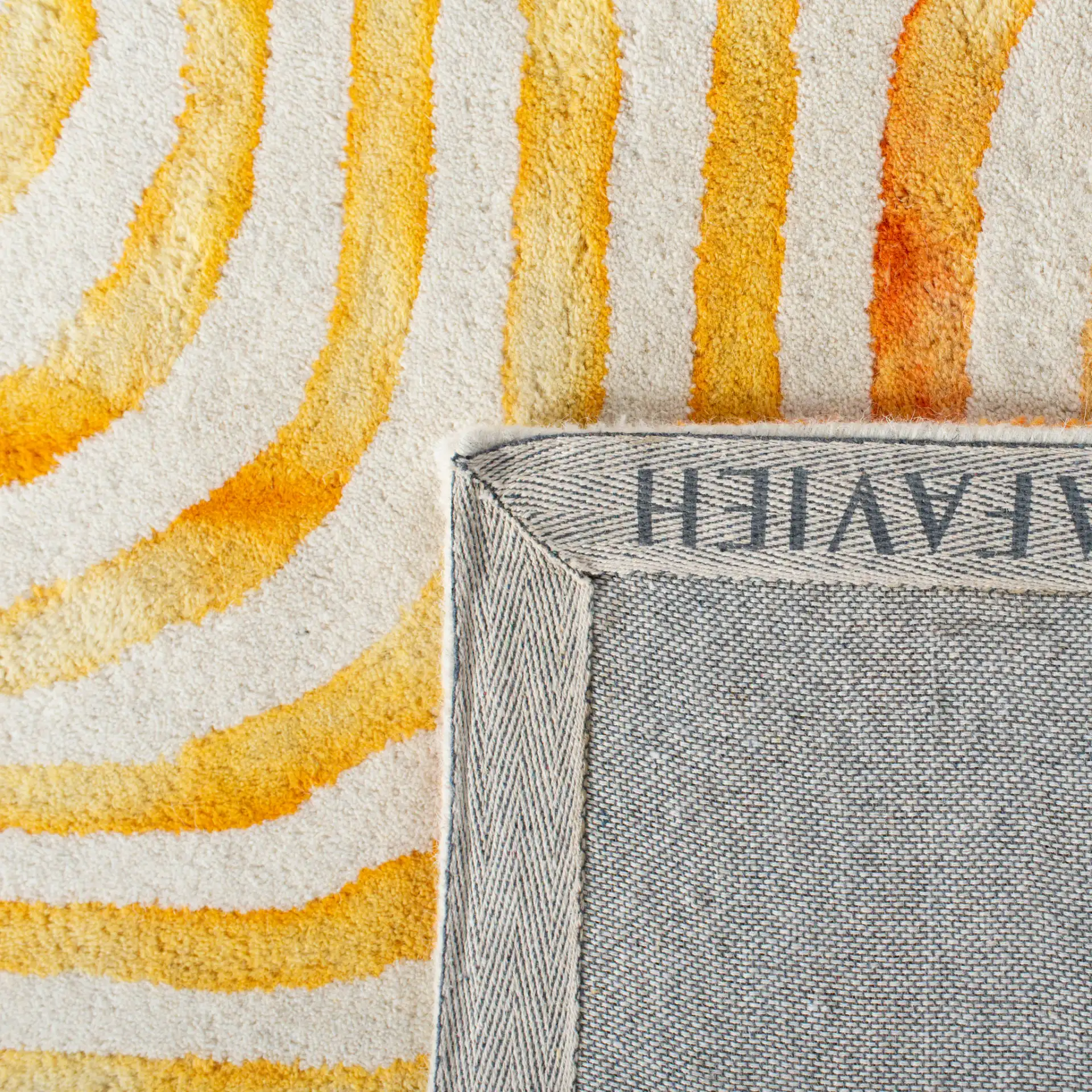 Dip Dye Wavy Stripe Hand-Tufted Rug in Ivory / Terracotta in a styled room