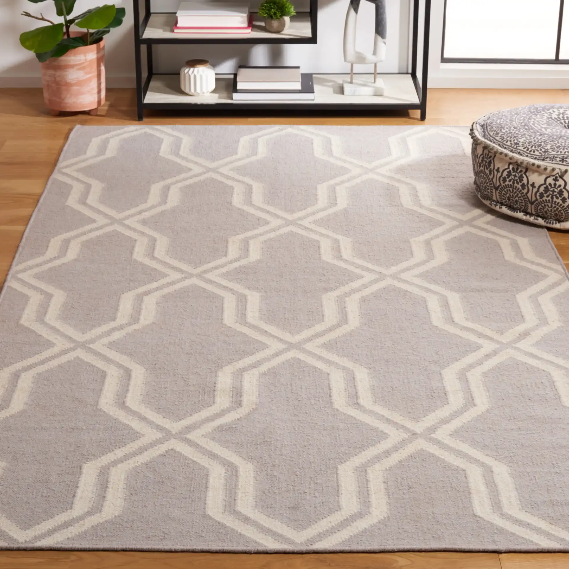Dhurries Geometric Trellis Hand-Woven Wool Rug in Gray / Ivory in a styled room