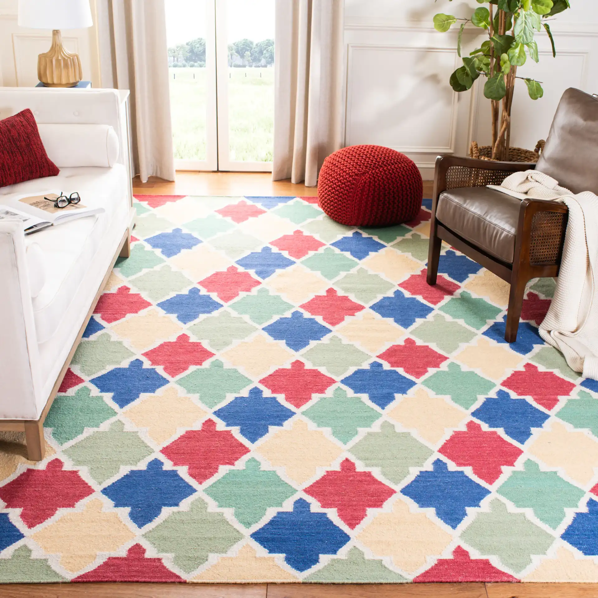 Dhurries Ogee Tile Hand-Woven Rug in Blue / Multicolor in a styled room