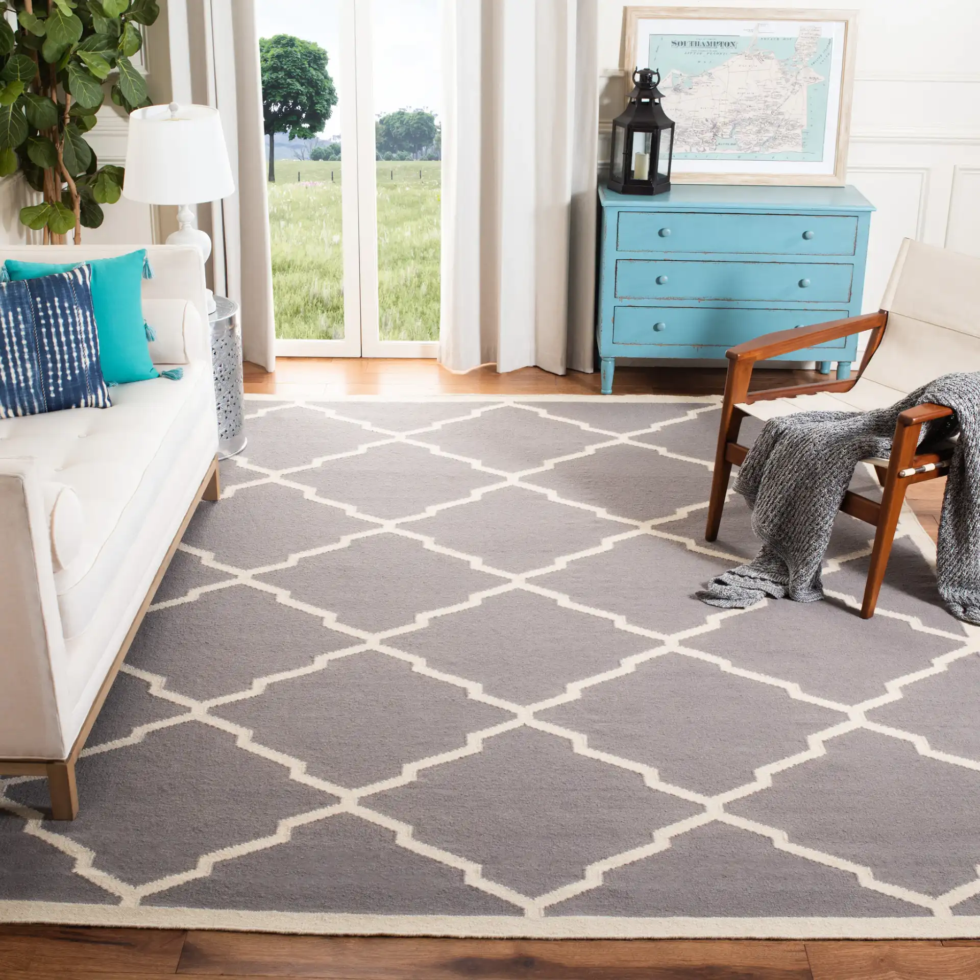 Dhurries Stepped Lattice Hand-Woven Rug in Gray / Ivory in a styled room